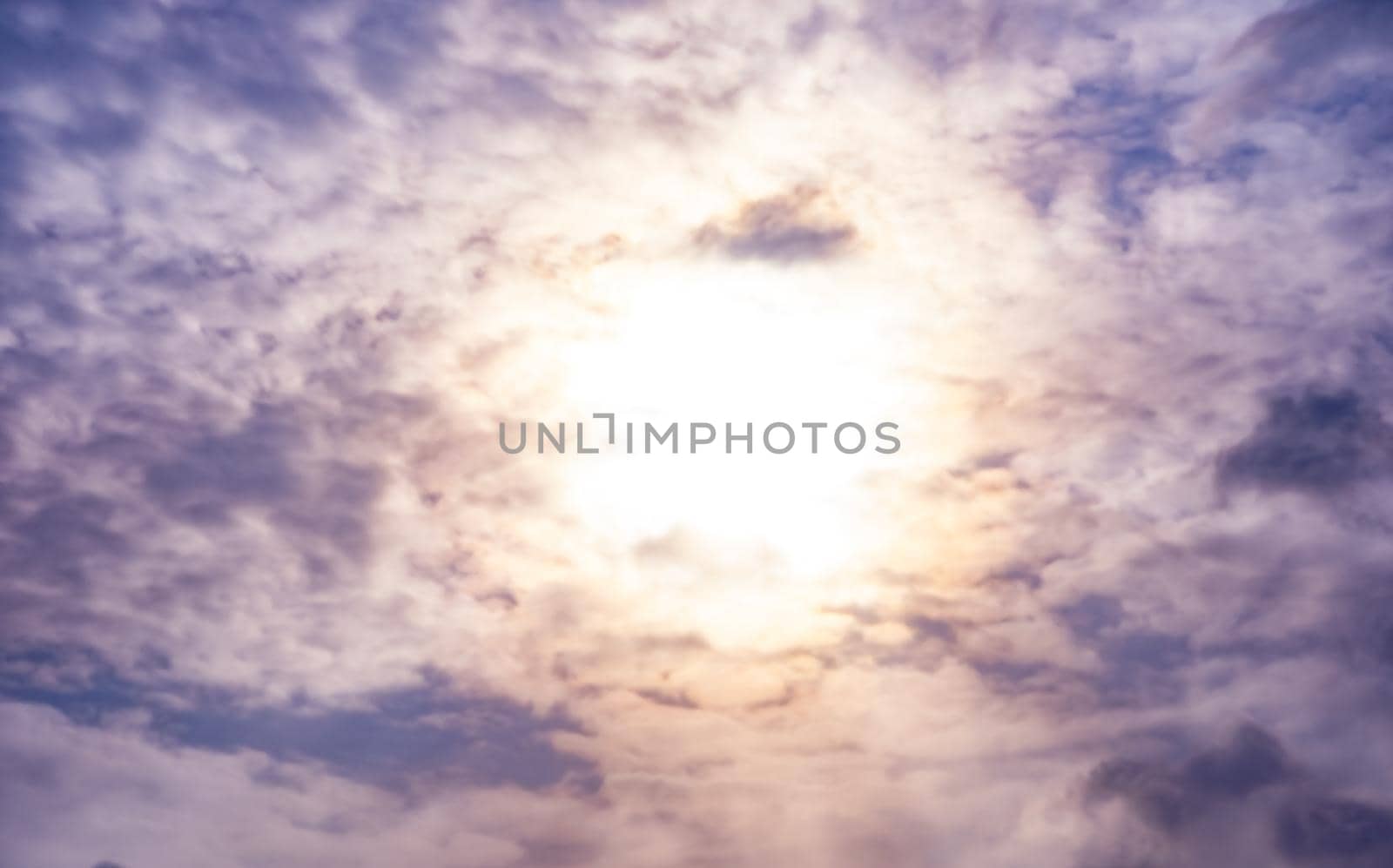 the sun through the clouds