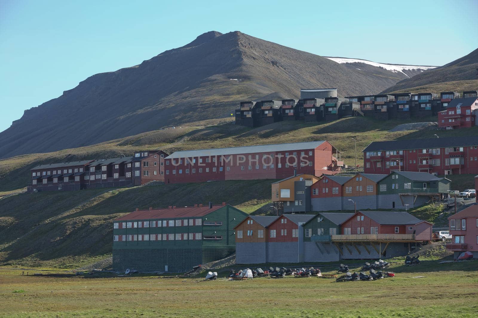Longyearbyen, Svalbard, Norway - July 22, 2017: Traditional colorful wooden houses on a sunny day in Longyearbyen Svalbard.