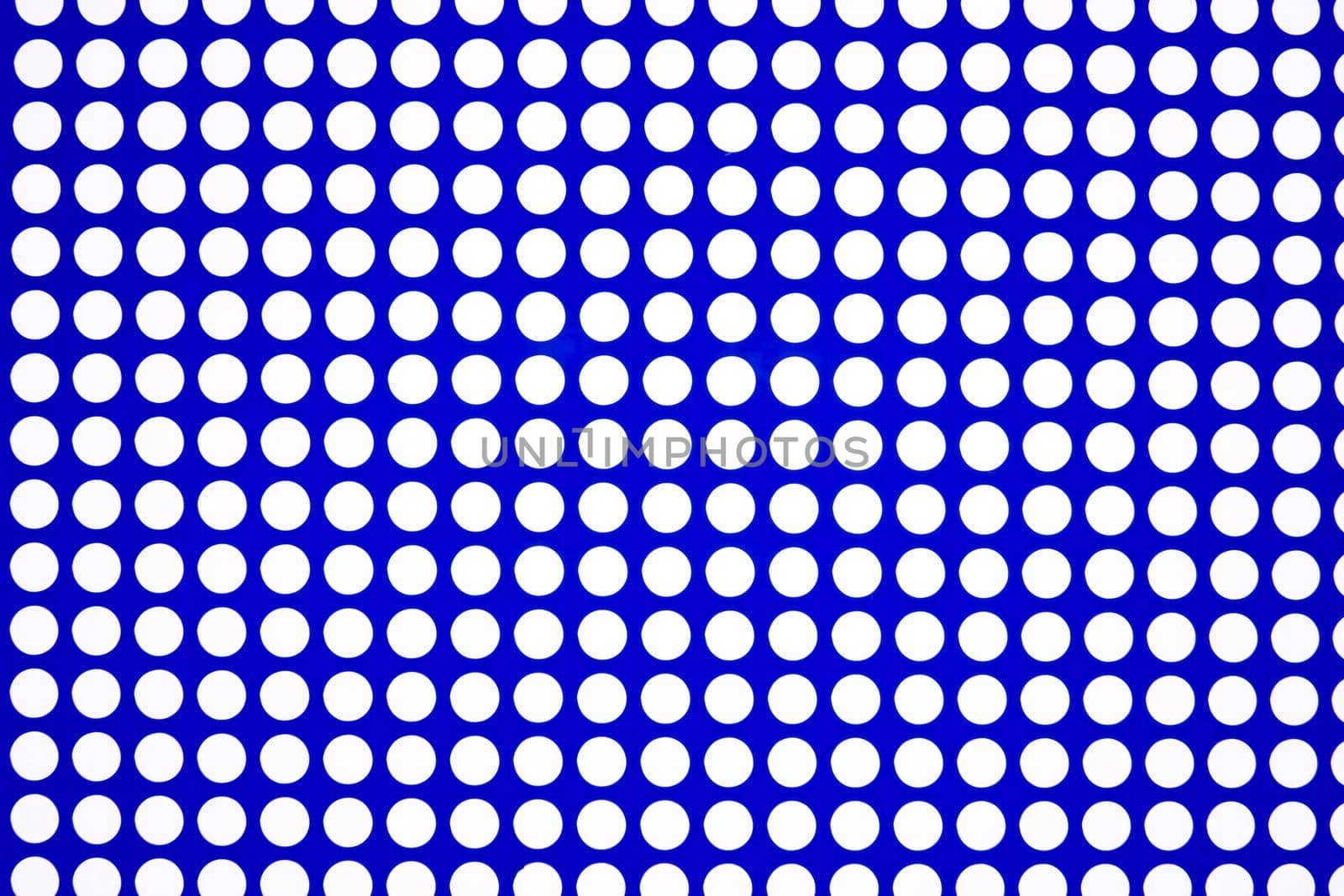white dots on a blue background