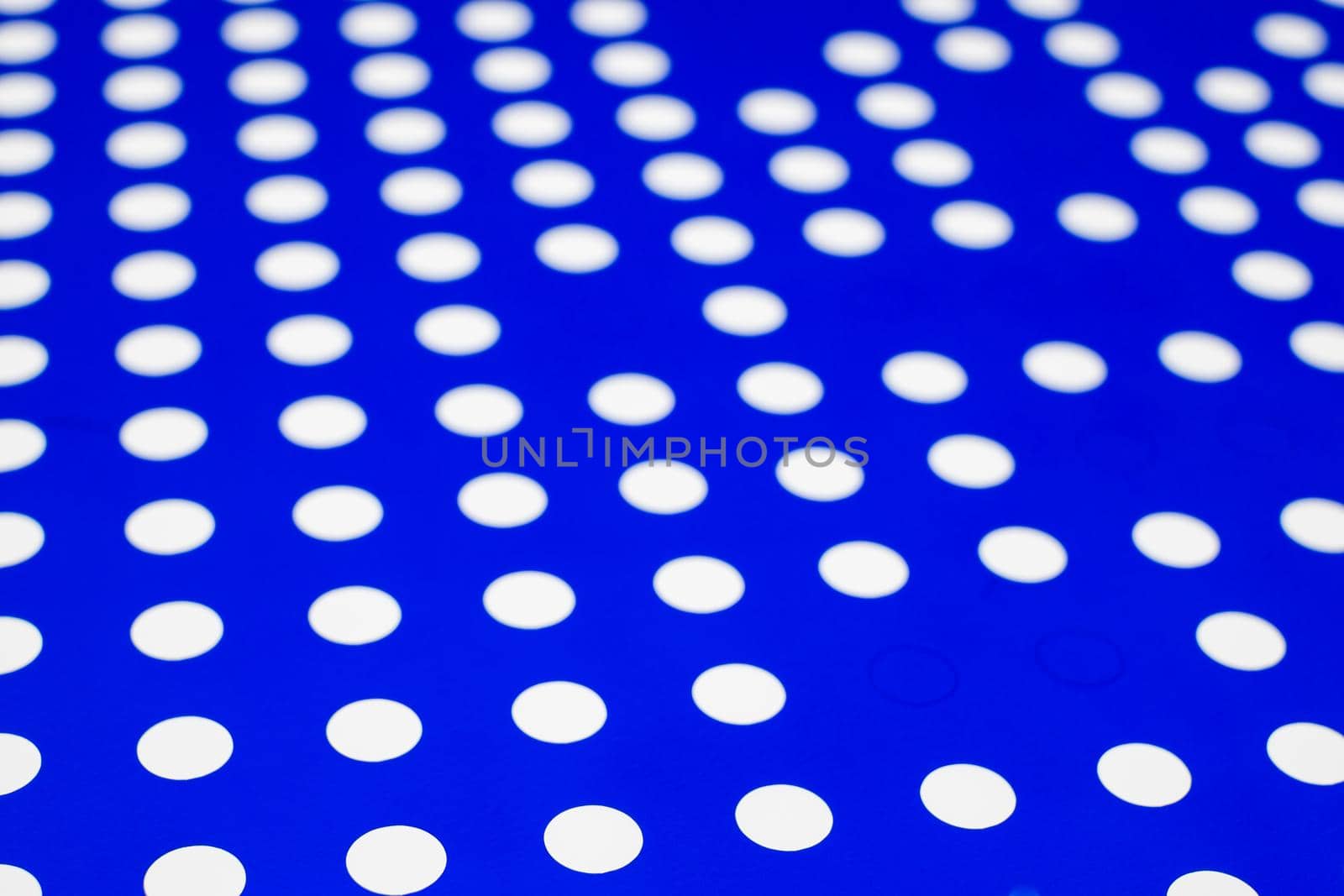 white dots on a blue background