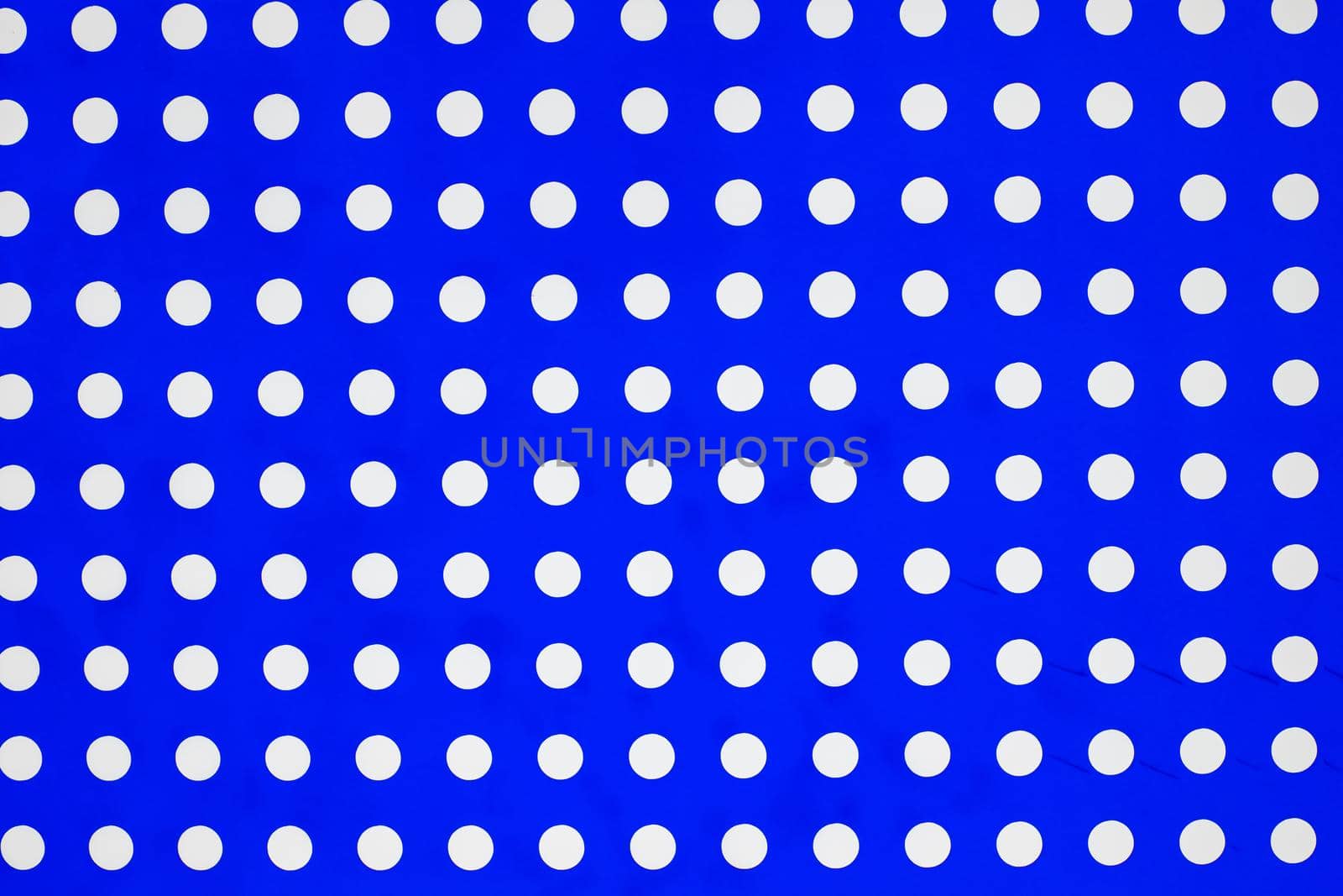white dots on a blue background