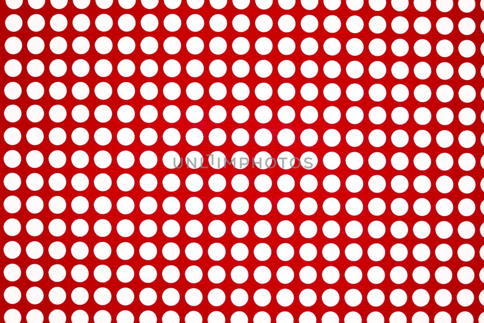 white dots on a red background