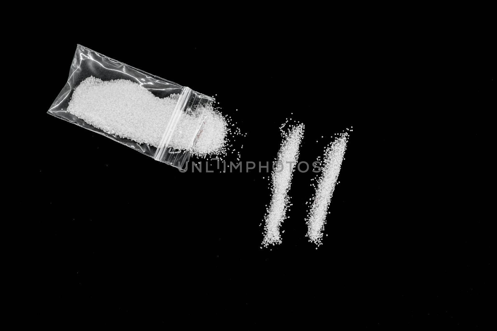 white drugs line on black background by Roberto