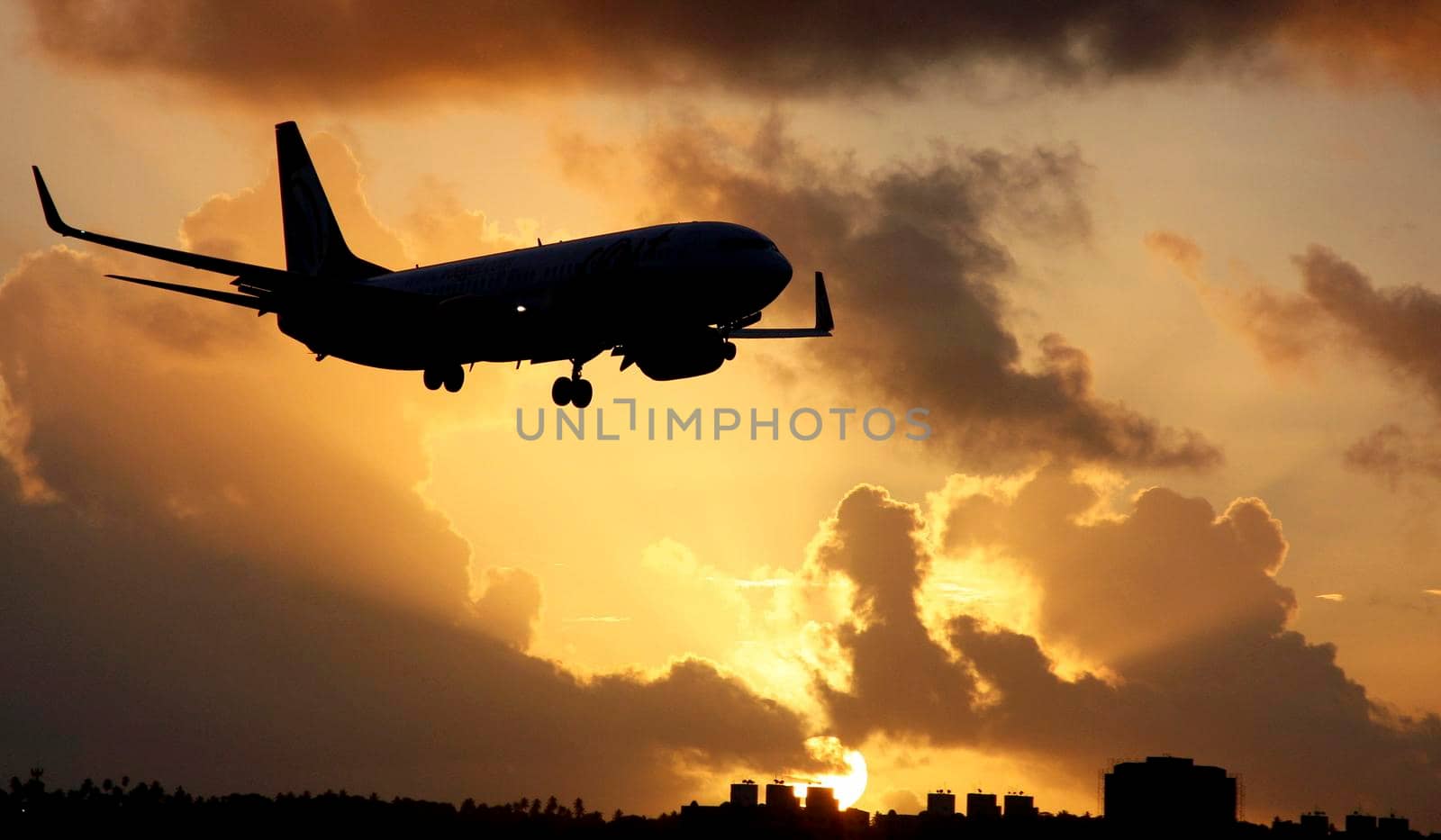 salvador, bahia / brazil - july 6, 2014: Boeing 737 of Gol Linhas Aereas seen during approach to land on Salvador Airport runway.
