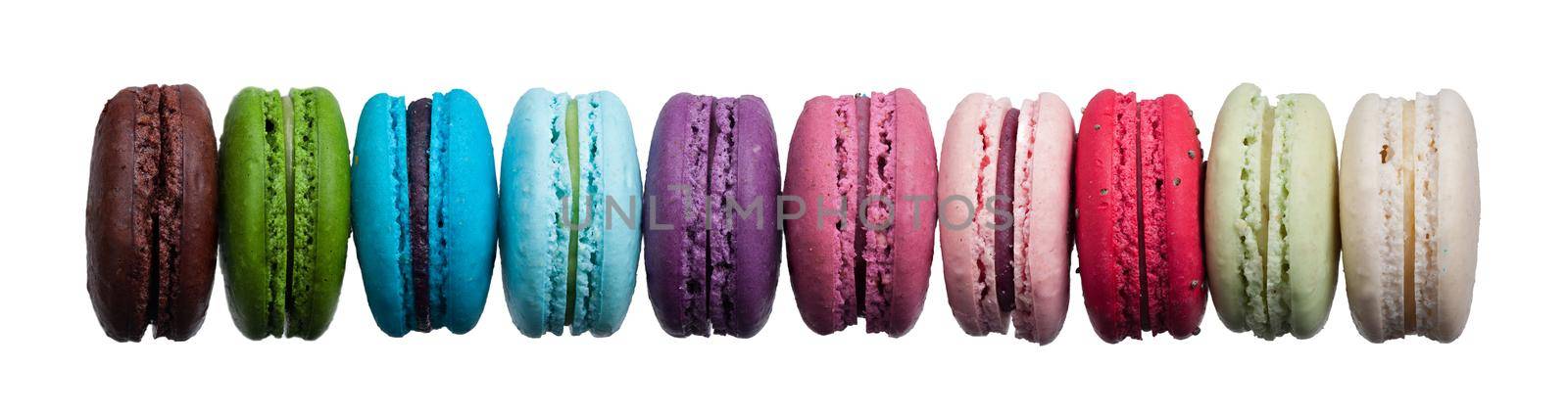 Colored macaroon on white background. High definition photo in close up