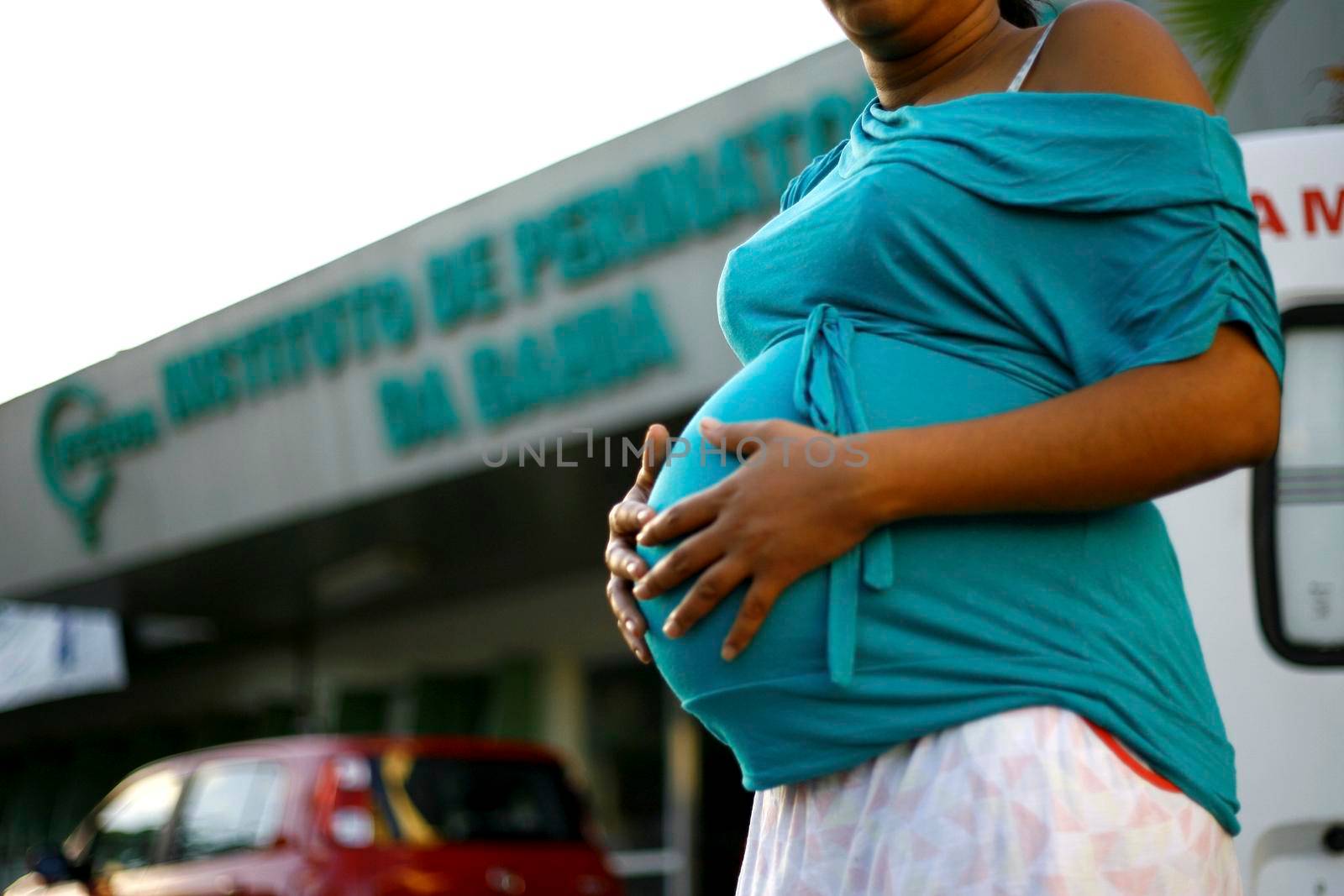 salvador, bahia / brazil - august 8, 2014: Pregnant woman is seen at the entrance of the Bahia Perinatology Institute in Salvador.