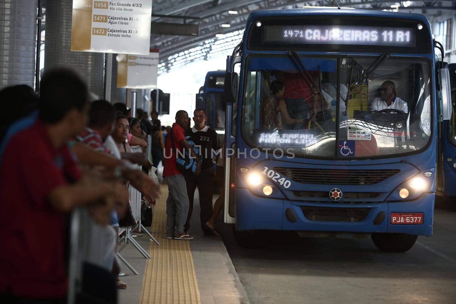 salvador, bahia / brazil - september 8, 2017: Passengers are seen while boarding buses at Mussurunga Station in Salvador.