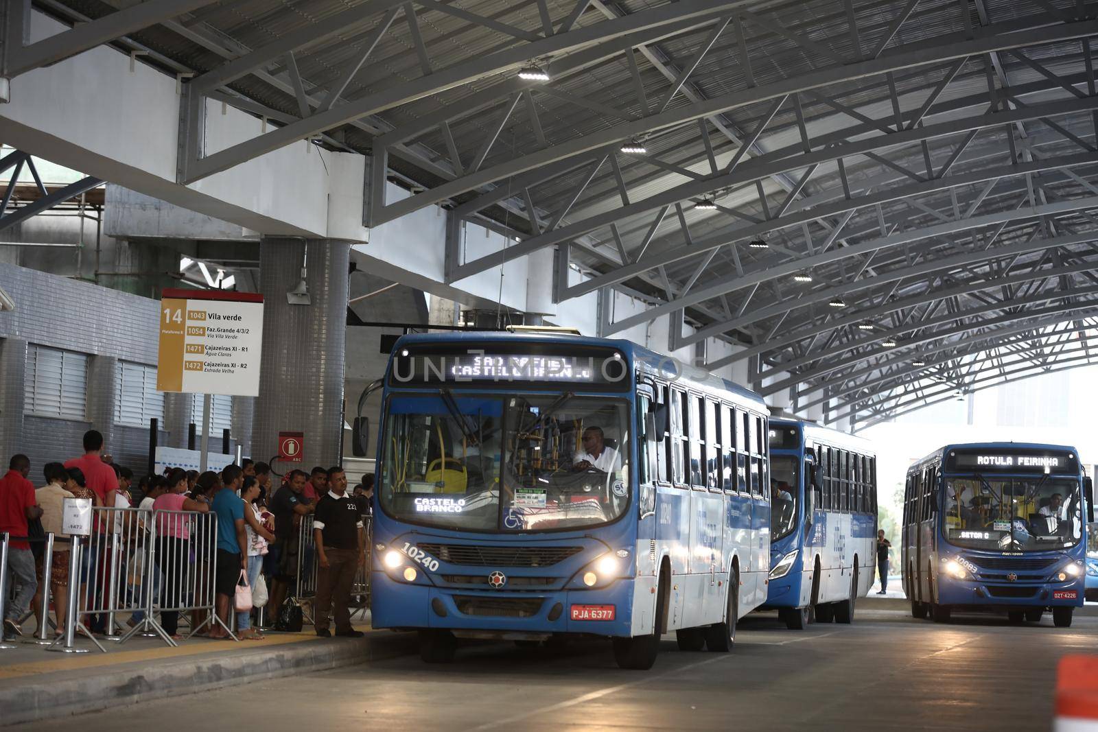 salvador, bahia / brazil - september 8, 2017: Passengers are seen while boarding buses at Mussurunga Station in Salvador.