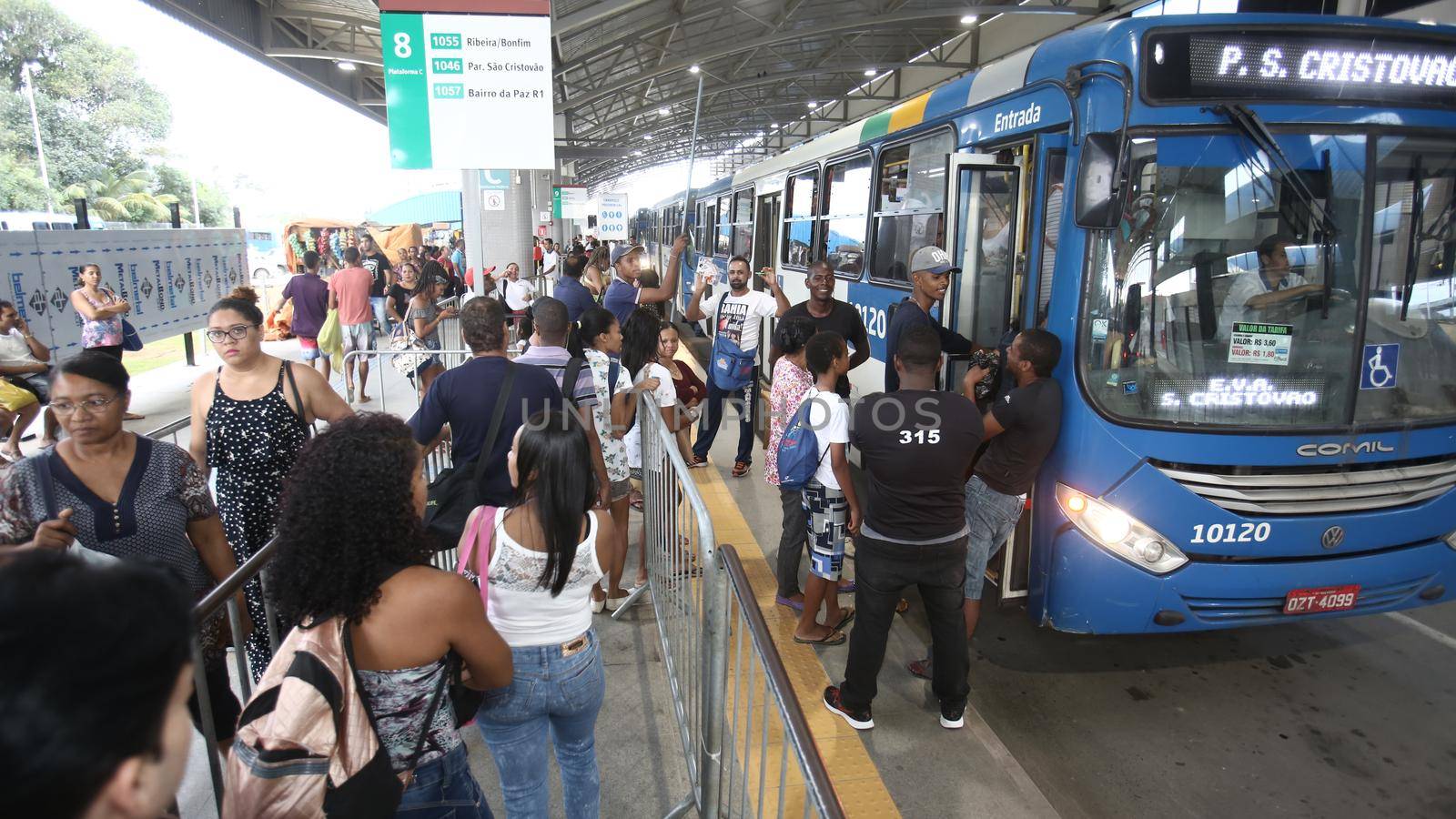 salvador, bahia / brazil - september 8, 2017: Passengers are seen while boarding buses at Mussurunga Station in Salvador.