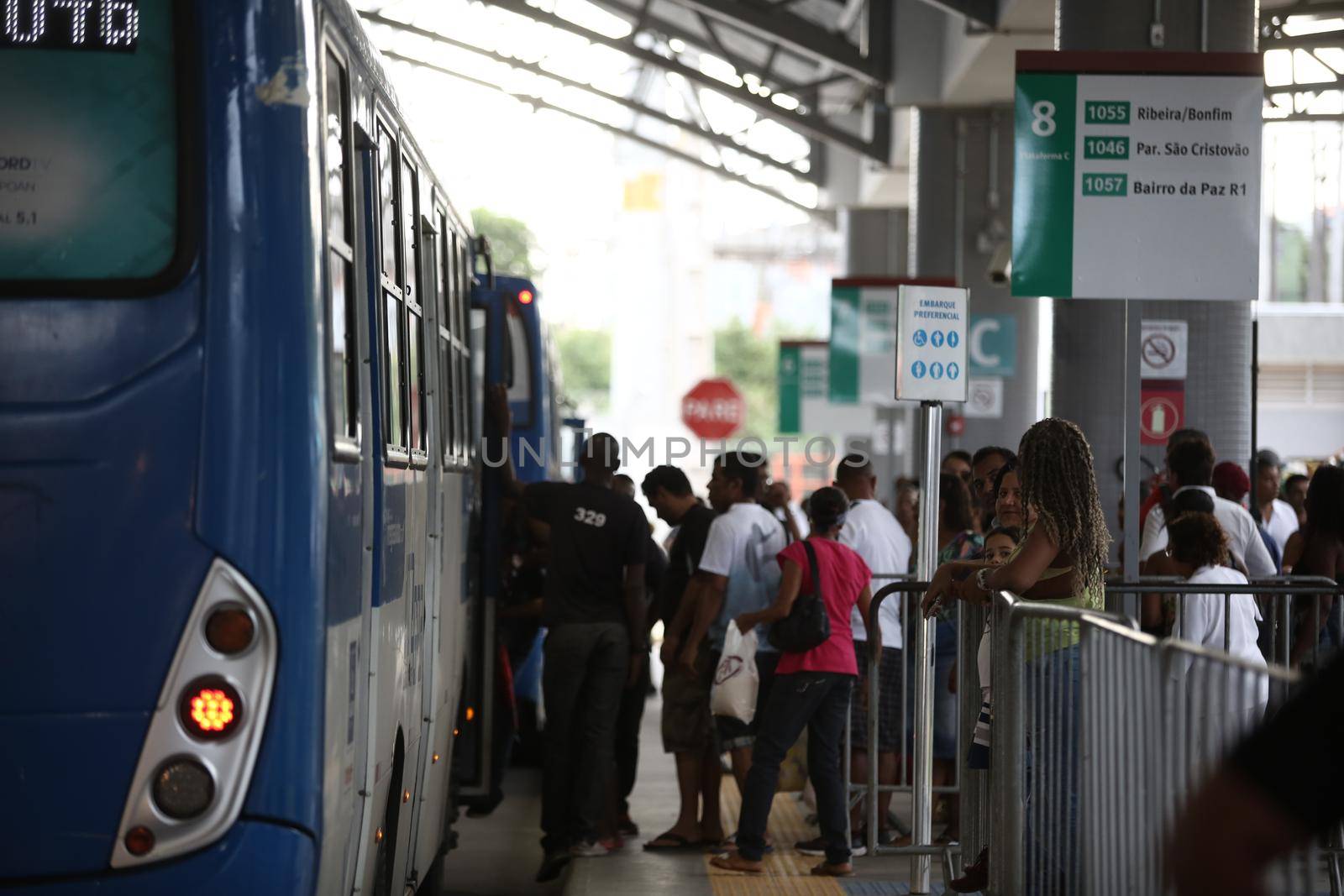 salvador, bahia / brazil - september 8, 2017: Passengers are seen while boarding buses at Mussurunga Station in Salvador.