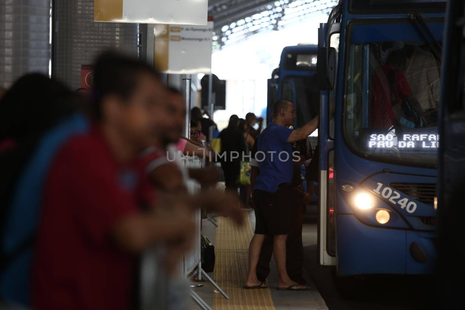 salvador, bahia / brazil - september 8, 2017: Passengers are seen while boarding buses at Mussurunga Station in Salvador.