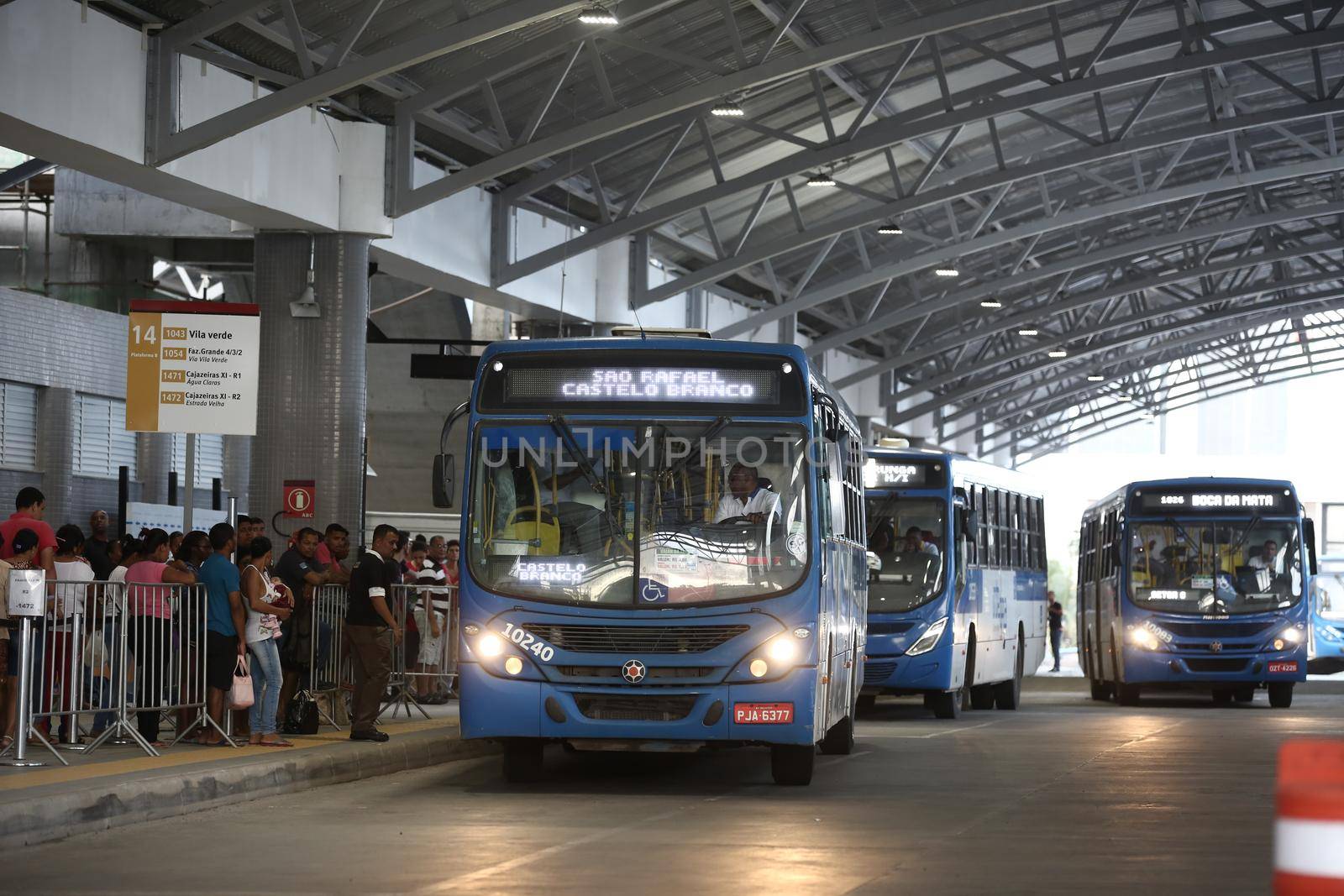 salvador, bahia / brazil - september 8, 2017: Passengers are seen while boarding buses at Mussurunga Station in Salvador.