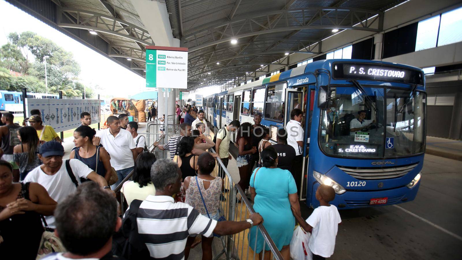 passengers at bus station in salvador by joasouza