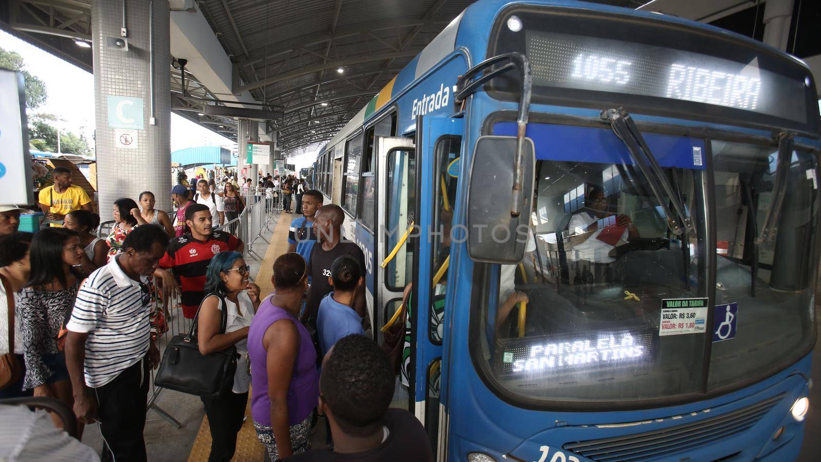 salvador, bahia / brazil - september 8, 2017: Passengers are seen while boarding buses at Mussurunga Station in Salvador.