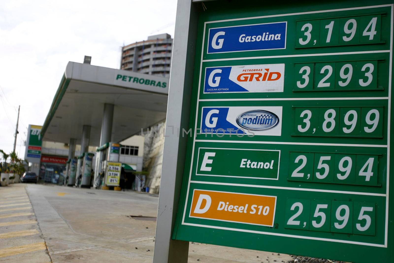 salvador, bahia / brazil - october 8, 2014: plate with fuel prices is seen at the entrance of a gas station in the city of Salvador.


