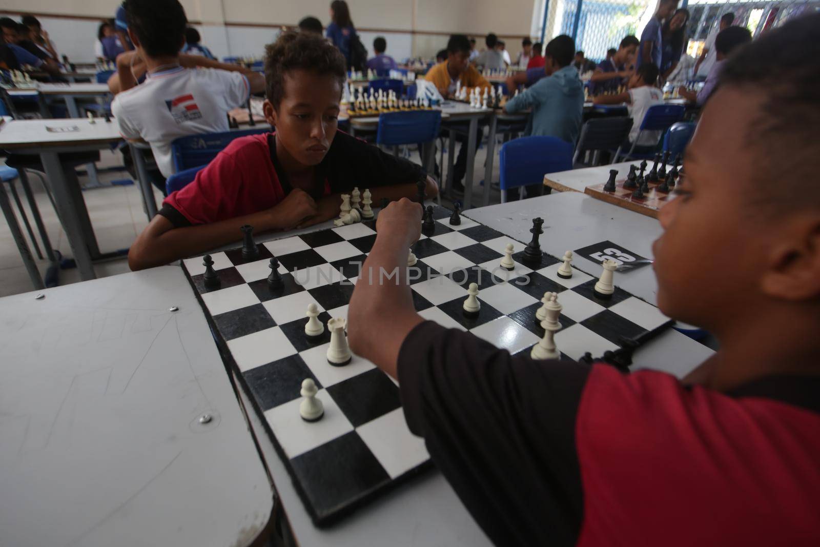 salvador, bahia / brazil - november 8, 2018: Public school students in the Paz neighborhood of Salvador are seen playing chess.