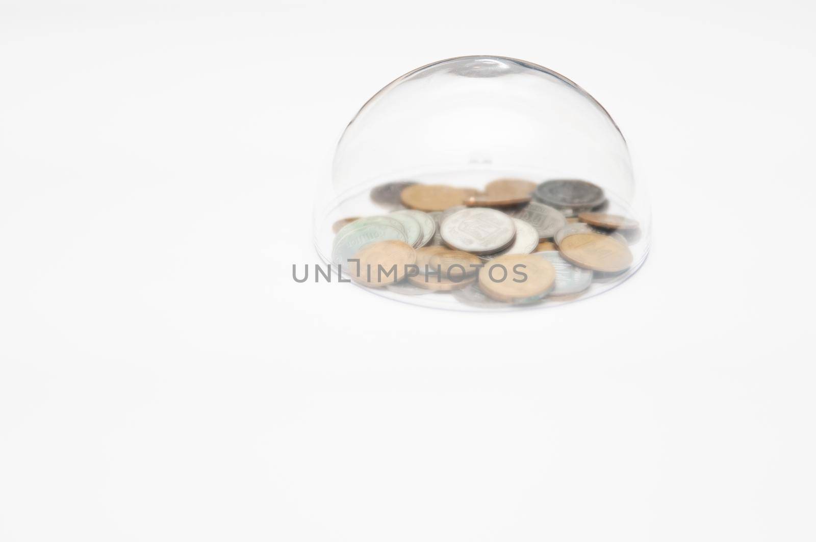 metal coins are grouped under a glass semicircle  by ozornina