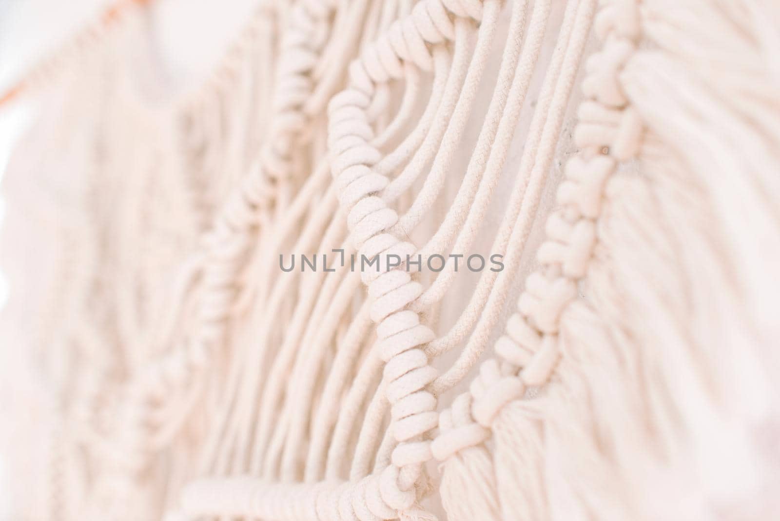 handmade macrame pattern a fragment of a wall panel in the boho style by ozornina