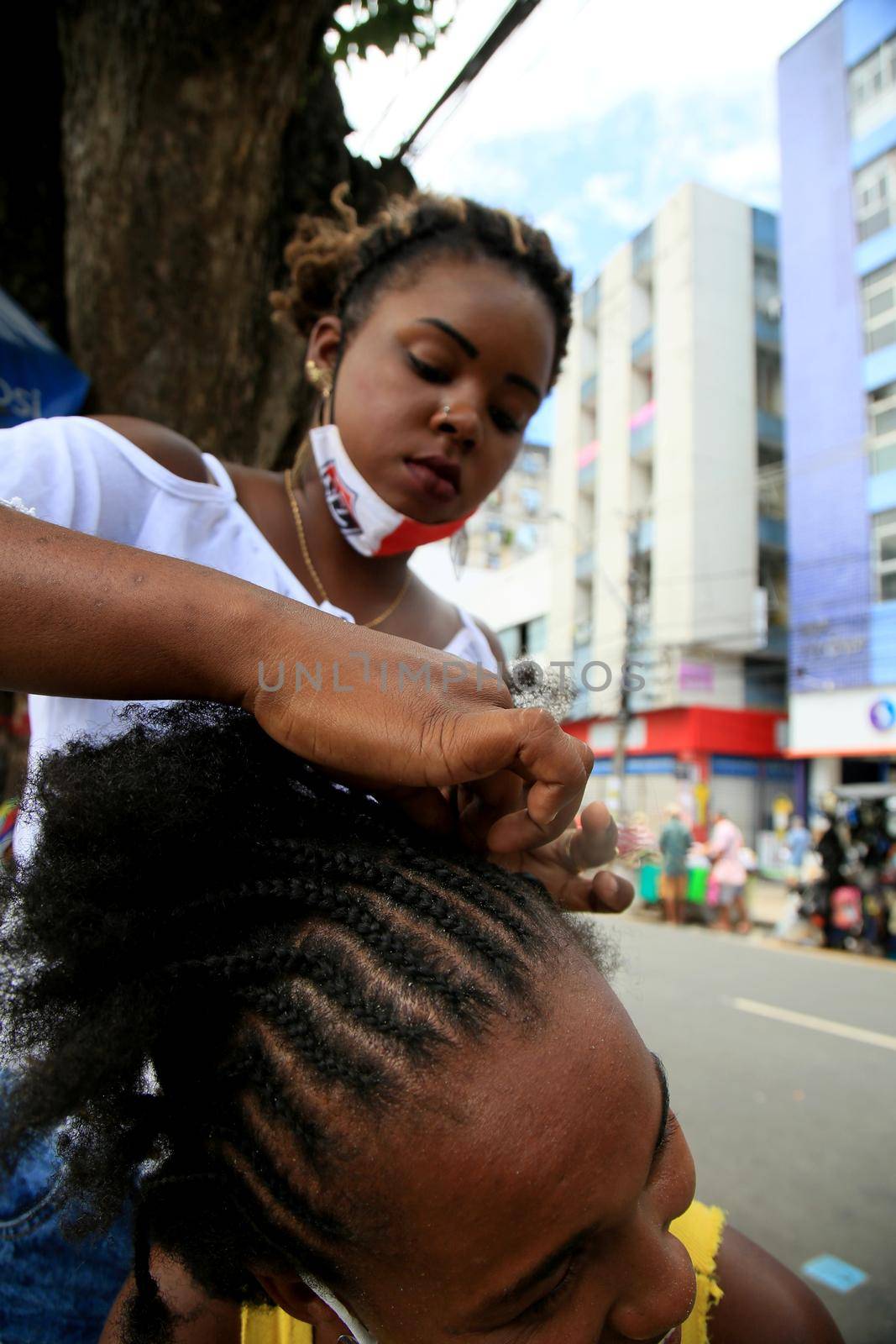 black woman braiding beautiful by joasouza