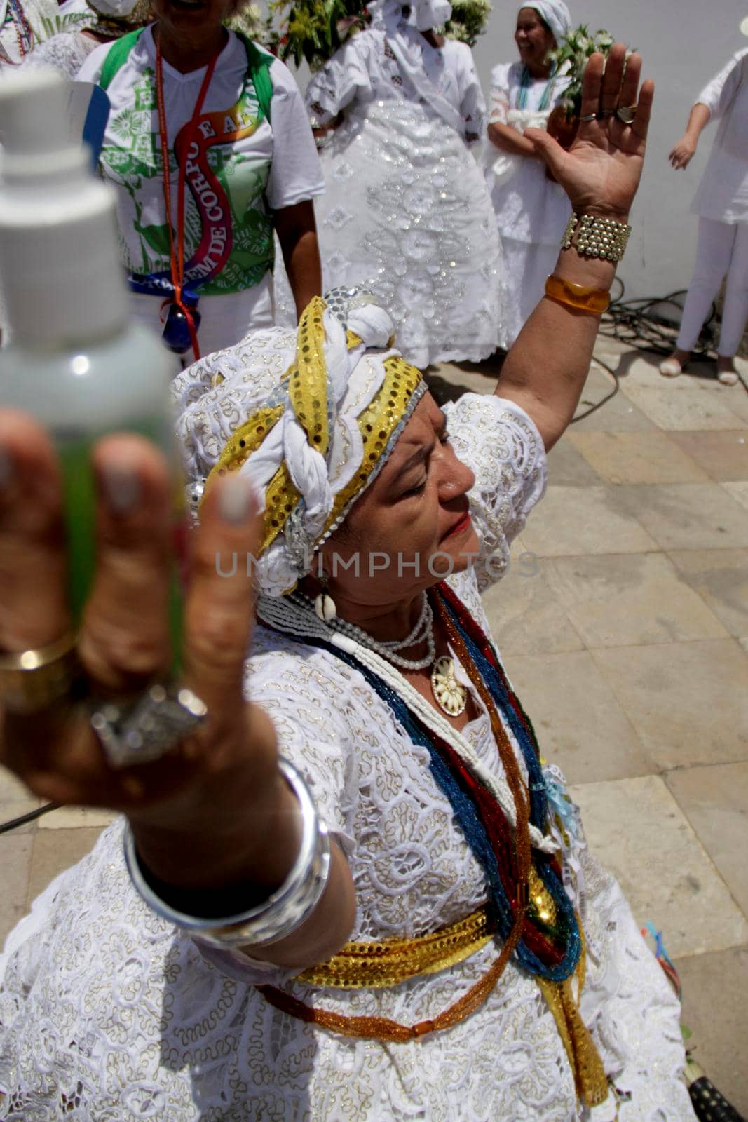 salvador, bahia / brazil - january 15, 2015: Baianas wash the stairs of the Church of Bonfim, during traditional party for Catholics and Candomble fan.