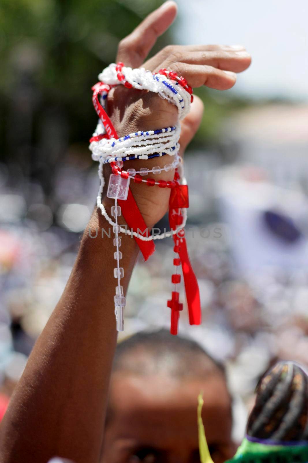 salvador, bahia, brazil - january 15, 2015: devotees of candomble and catholics participate in the washing phase of the staircases of the church of Bonfim in the city of Salvador.