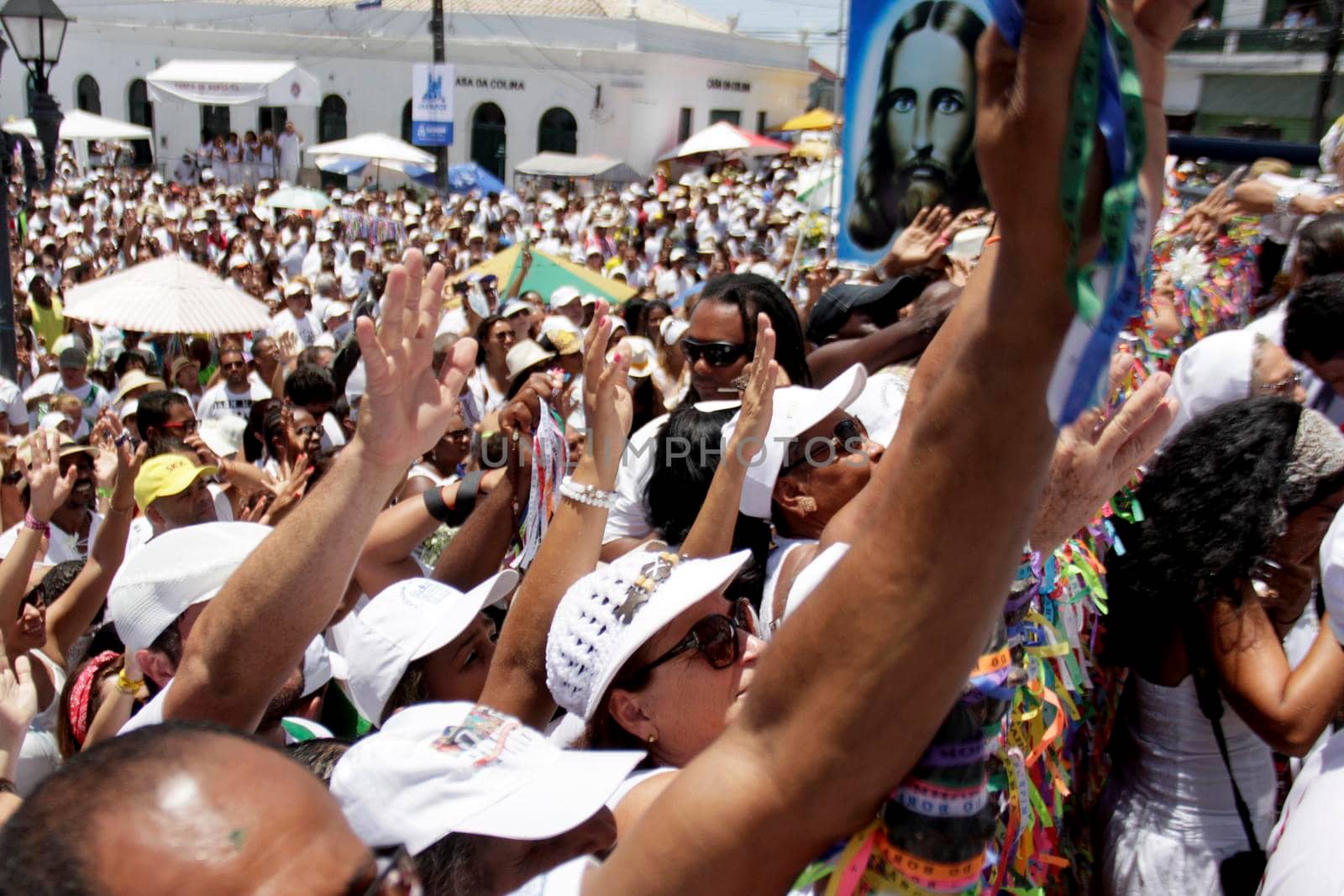 salvador, bahia, brazil - january 15, 2015: devotees of candomble and catholics participate in the washing phase of the staircases of the church of Bonfim in the city of Salvador.