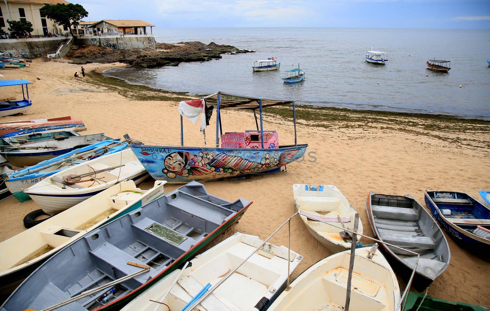 salvador, bahia, brazil - january 15, 2021: fishing boats are seen collected in the sand of Paciencia beach, in the Rio Vermelho neighborhood, in the city of Salvador, due to rainy weather.