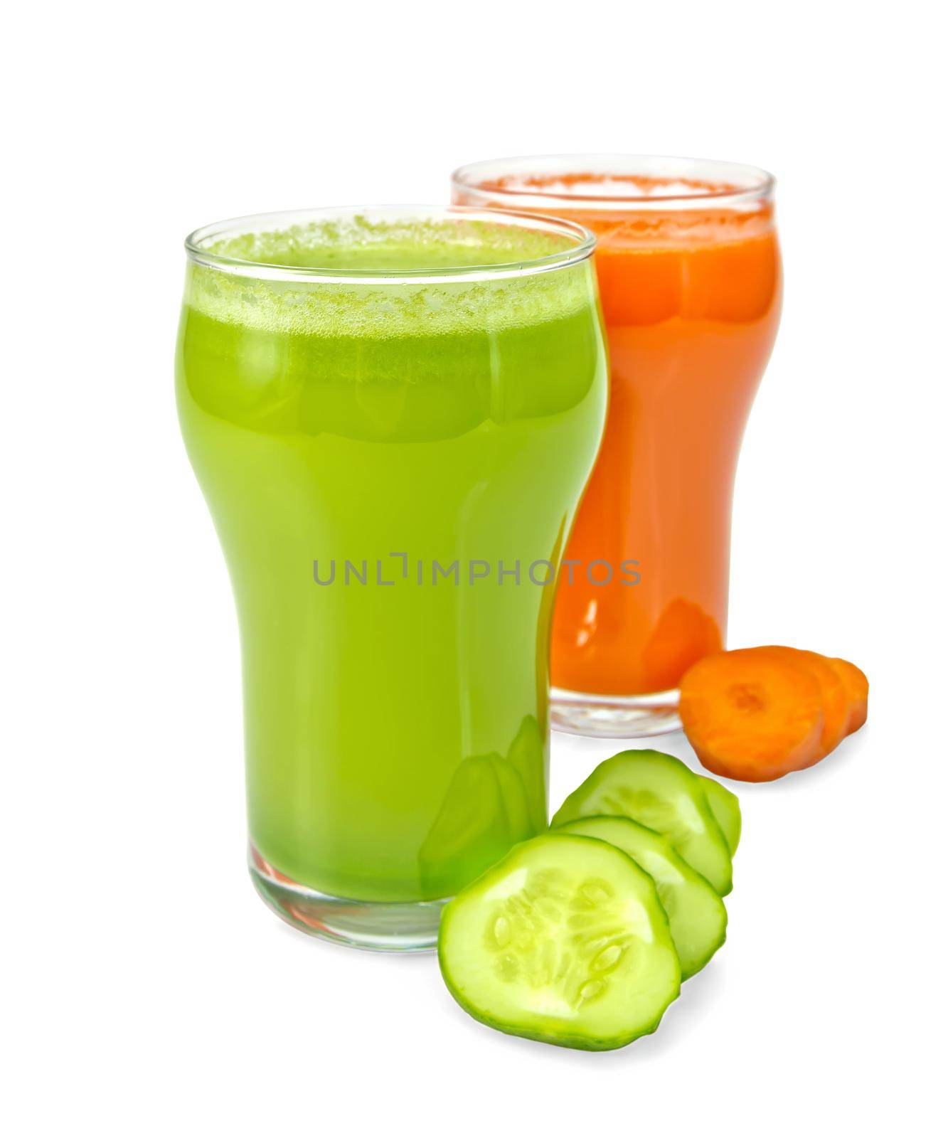 Two tall glass juice of carrot and cucumber, slices of vegetables isolated on white background