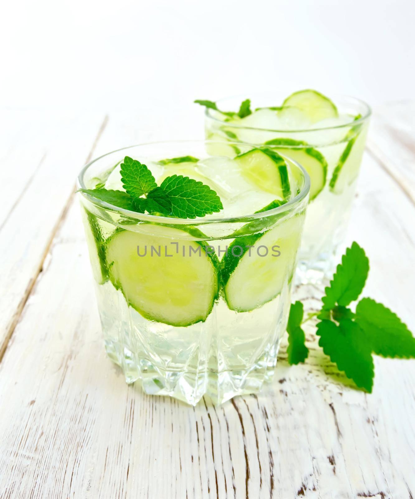 Lemonade with cucumber and mint on board by rezkrr