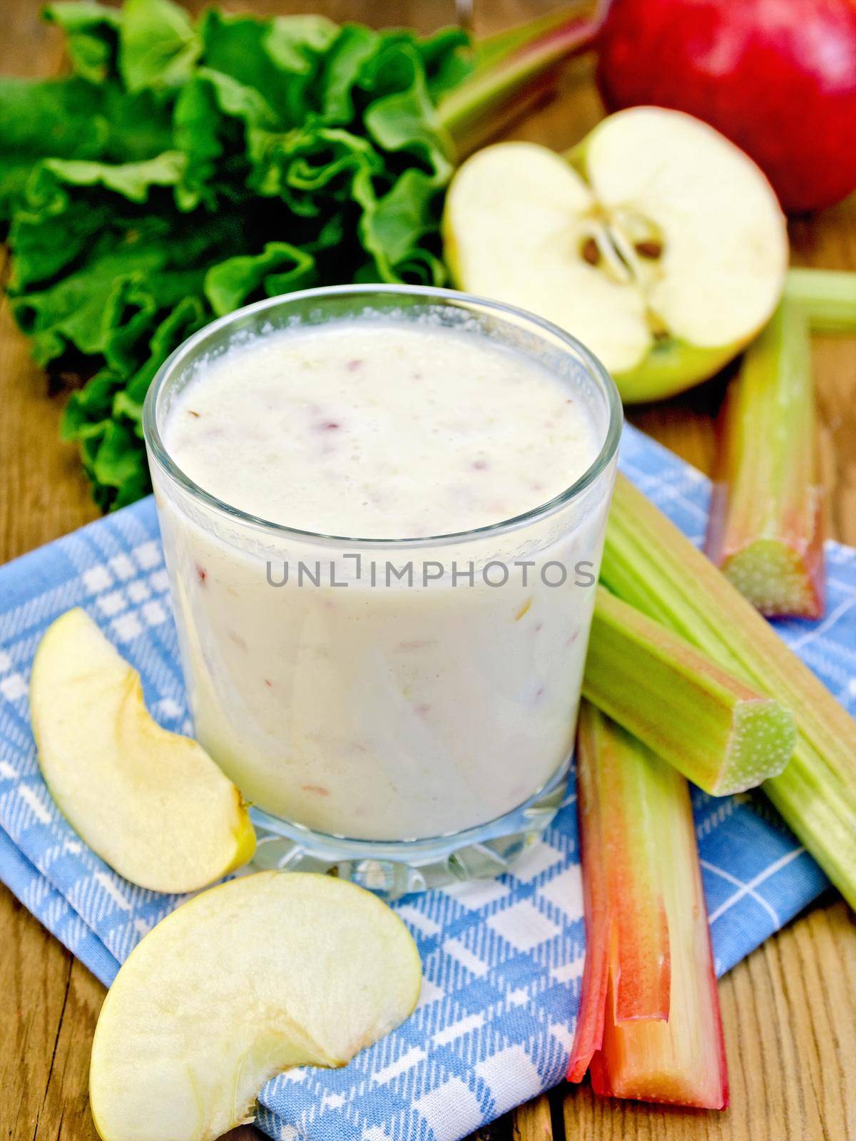 Milkshake with rhubarb and apples on napkin by rezkrr