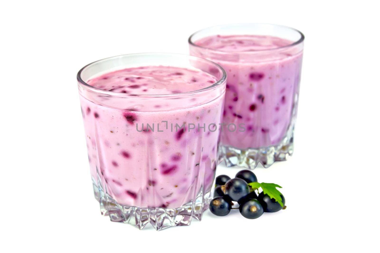 Milkshake with black currants in two glass by rezkrr