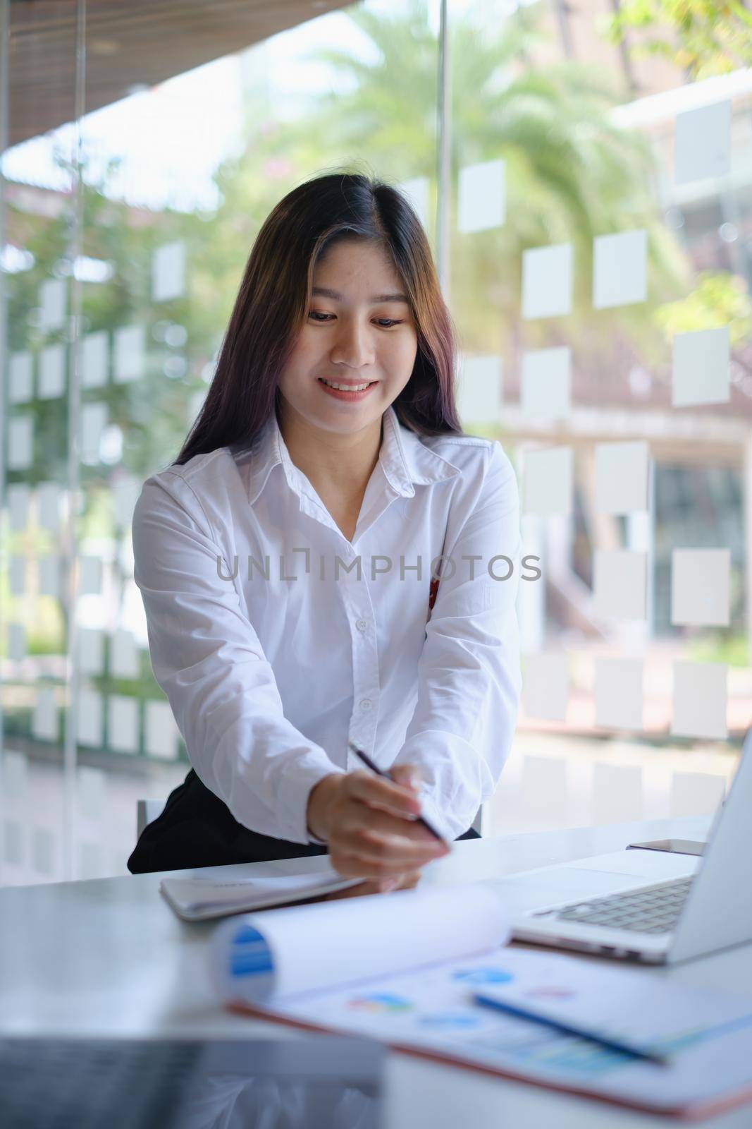 Closeup of Accountant female calculating tax report. Financial, business,analyze concept