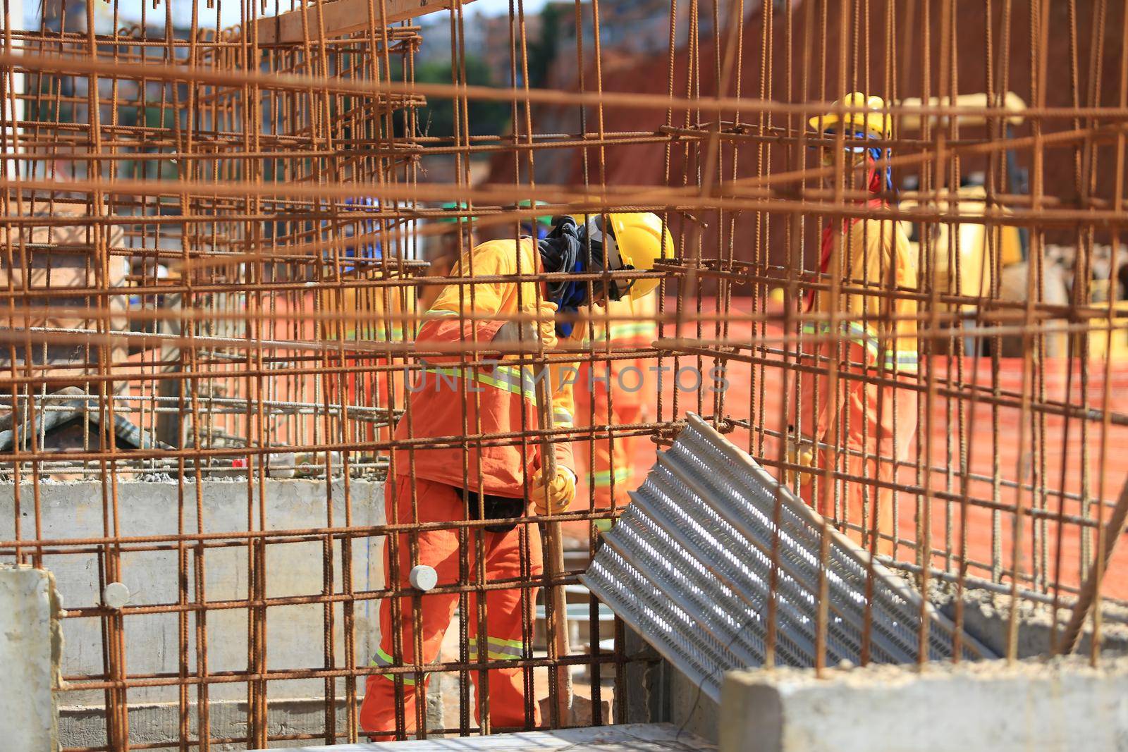 salvador, bahia / brazil - march 23, 2017: Workers seen at construction work of the bus terminal in the city Salvador.