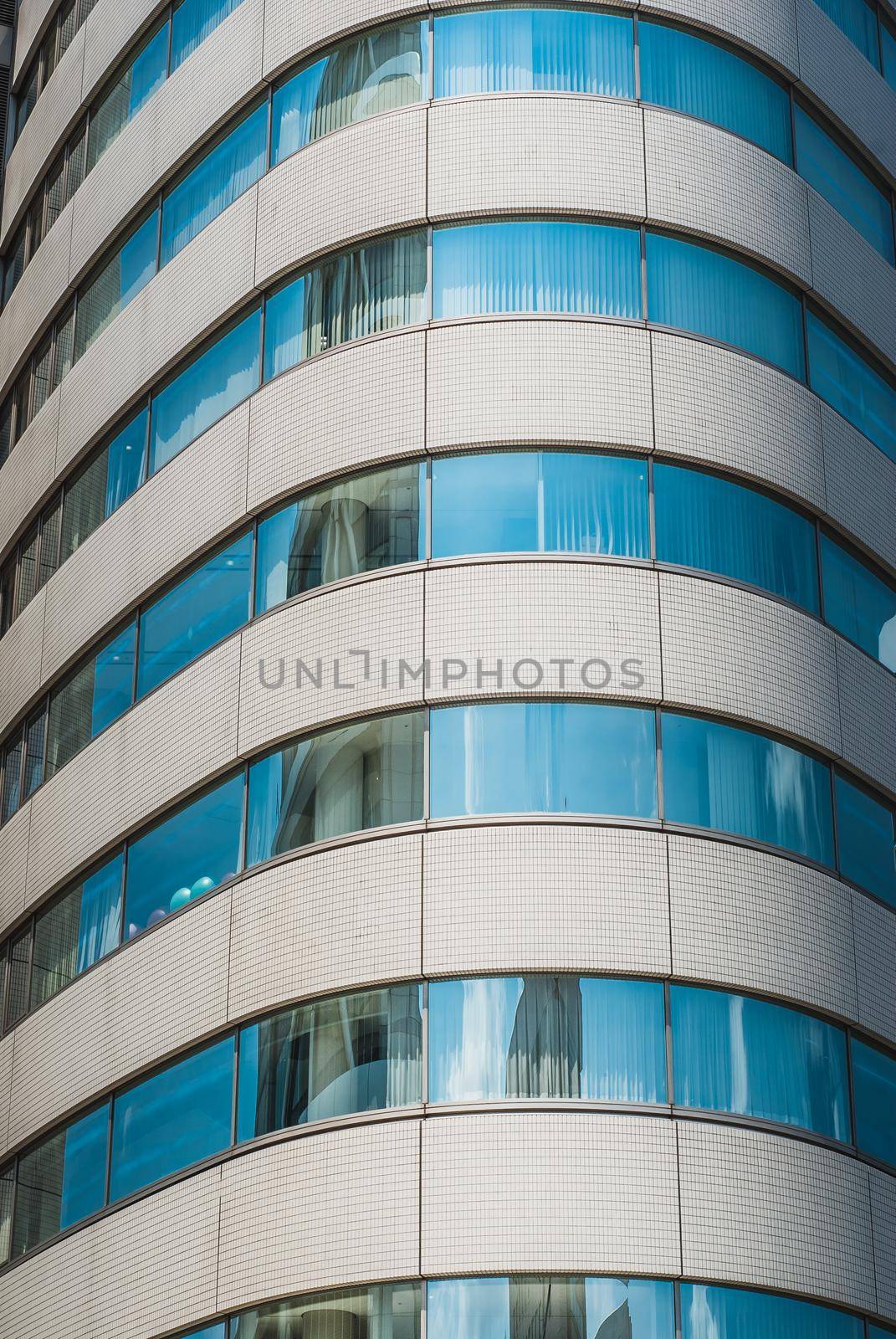 Skyscrapers and business buildings in Tokyo's Shibuya district by raphtong