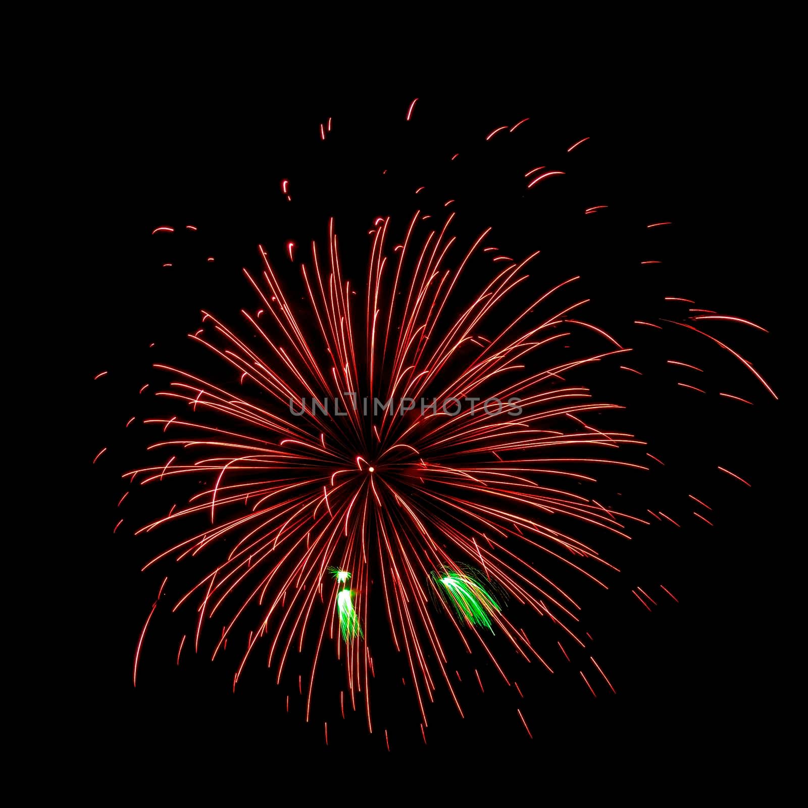 Colorful fireworks isolated on black sky background.