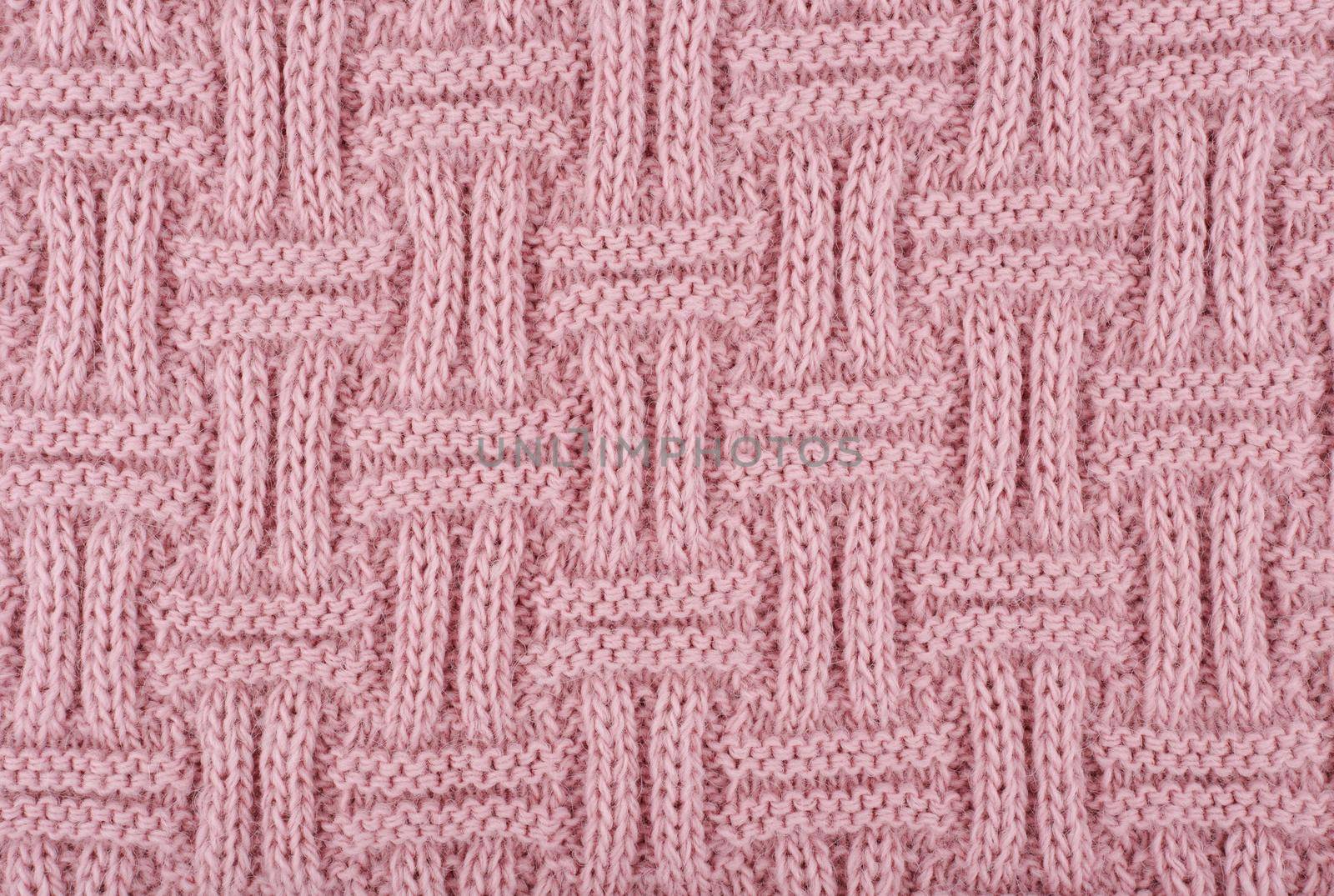 Dusty purple knitted texture with pattern. Hand made knitted close up. Concept of template for backgrounds