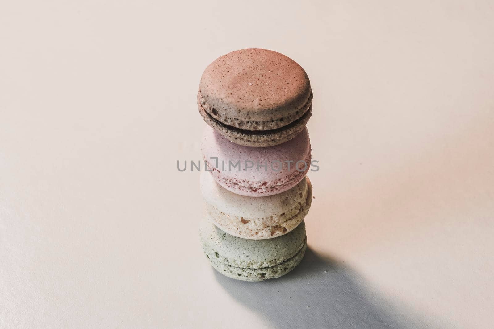Macarons in different colours on a background 