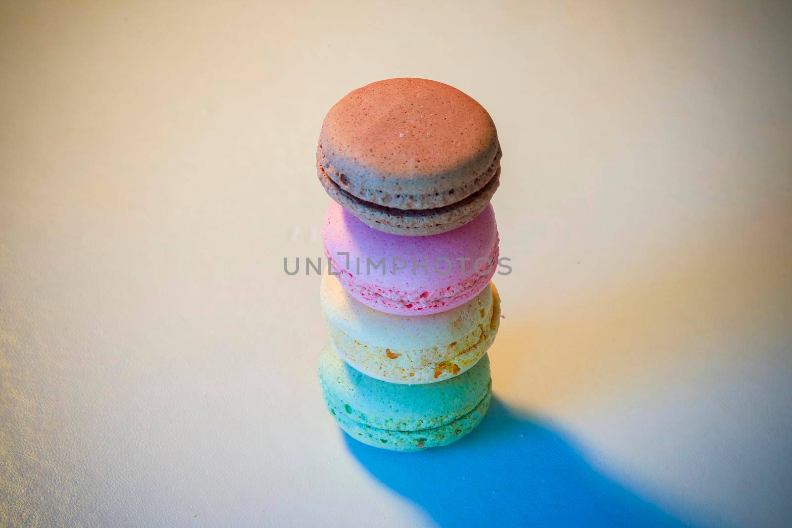 Macarons in different colours on a background 