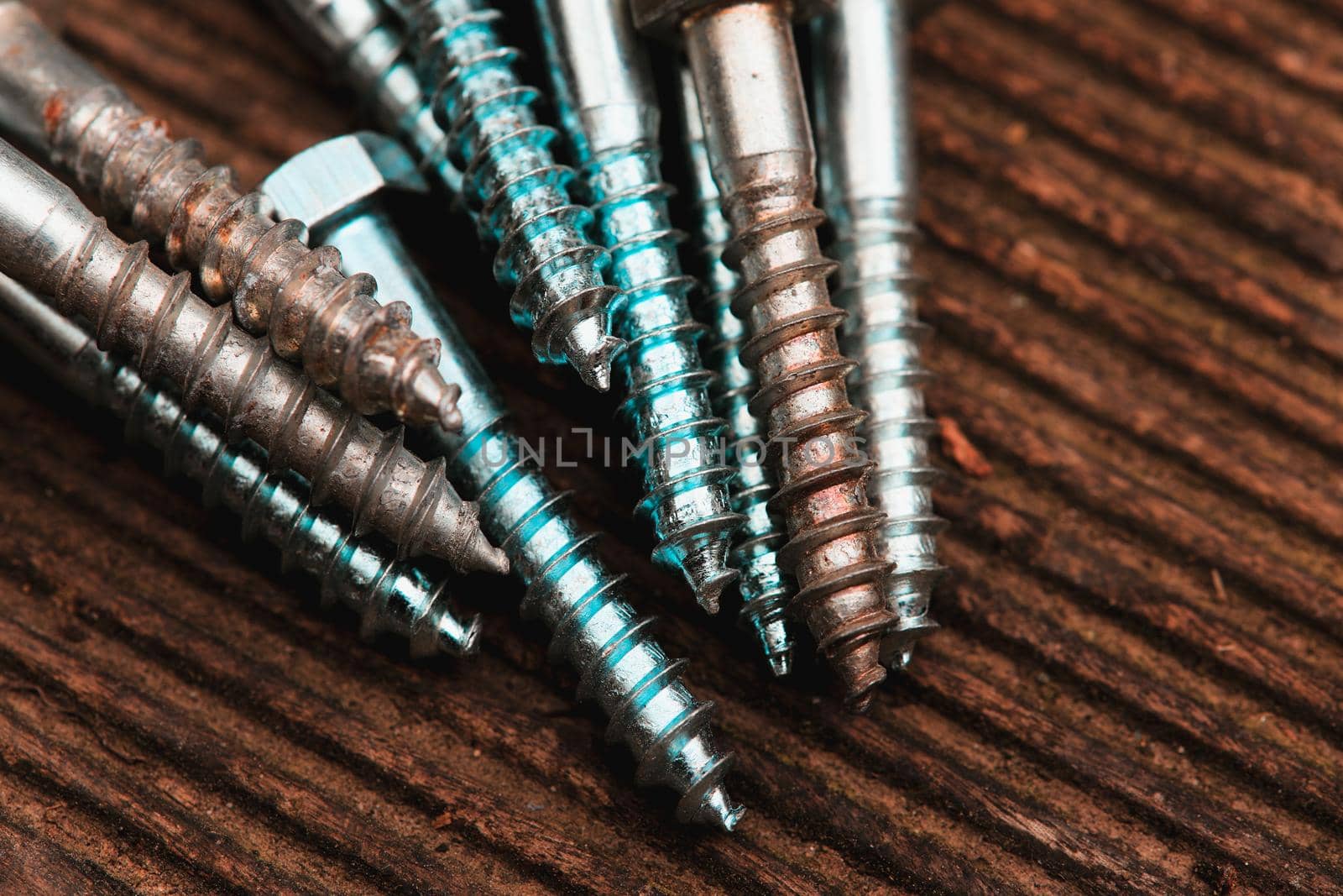 Different Kind of Screws on a table in a workshop