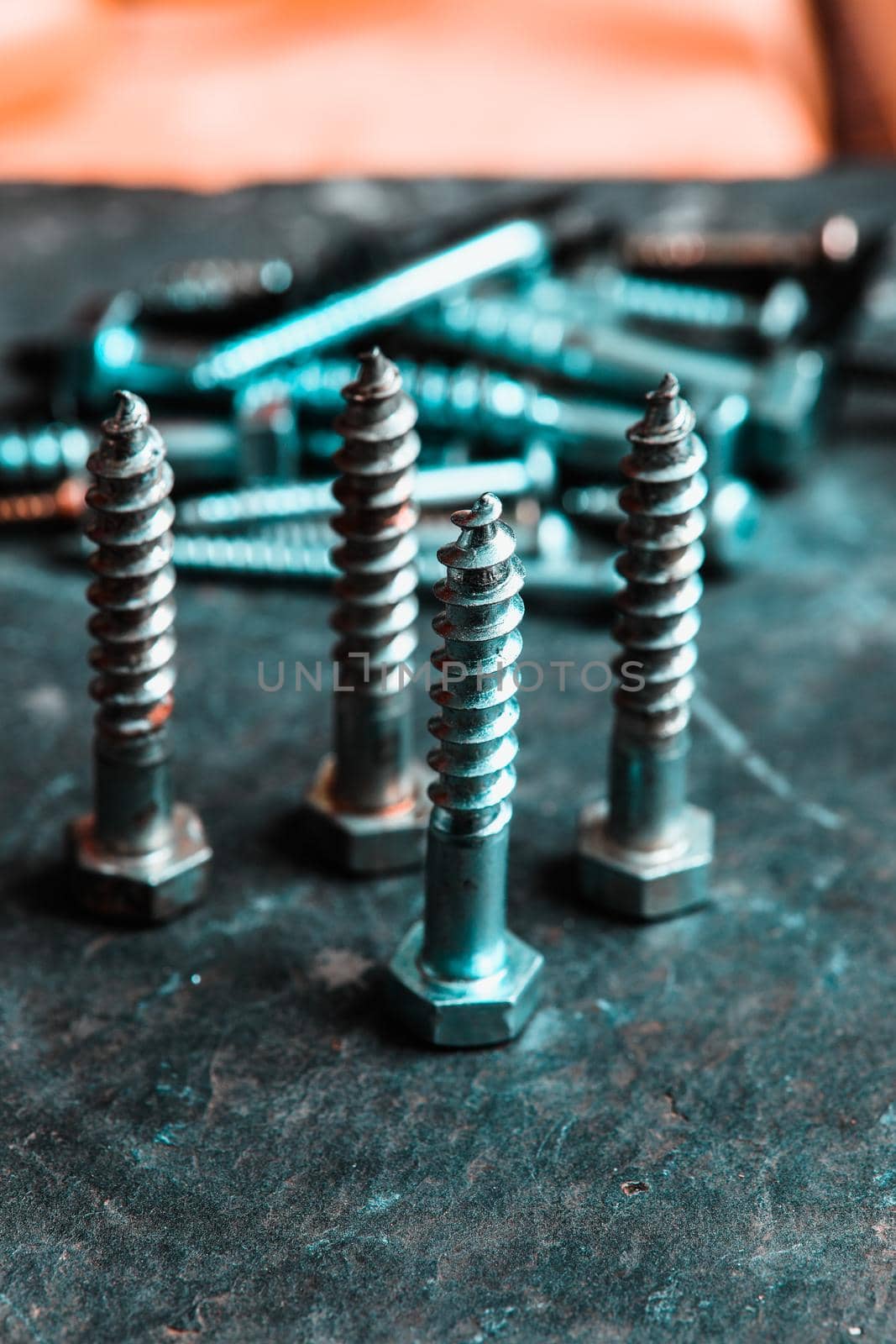 Different Kind of Screws on a table in a workshop
