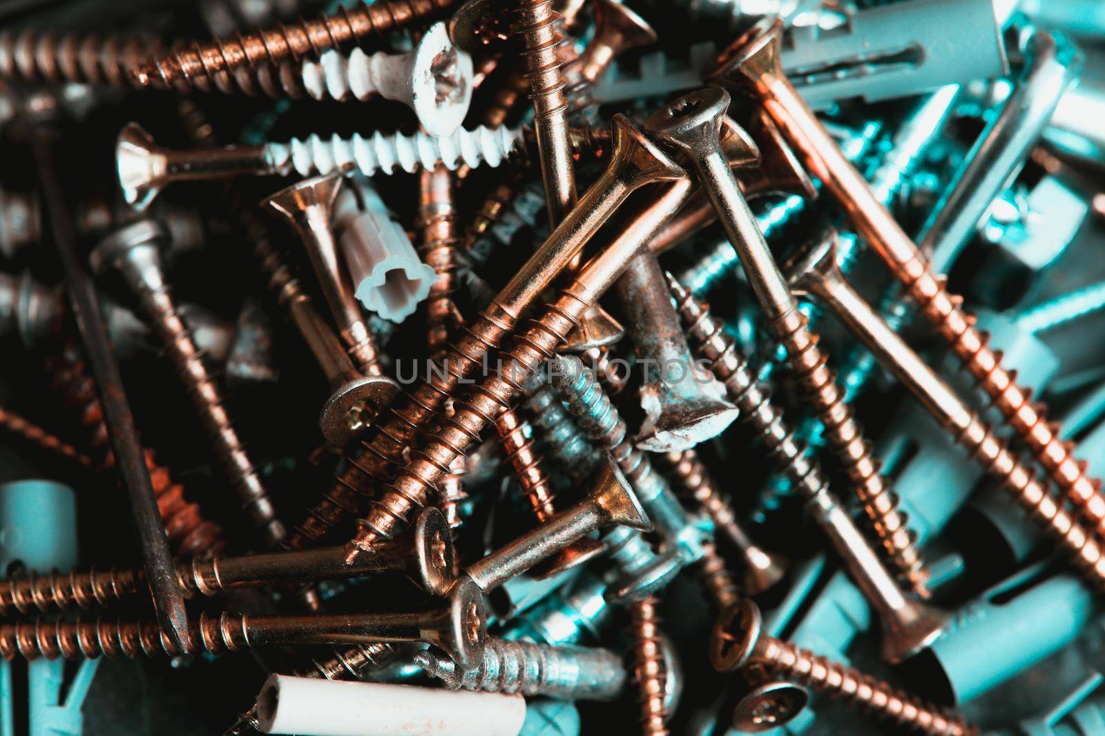 Different Kind of Screws on a table in a workshop