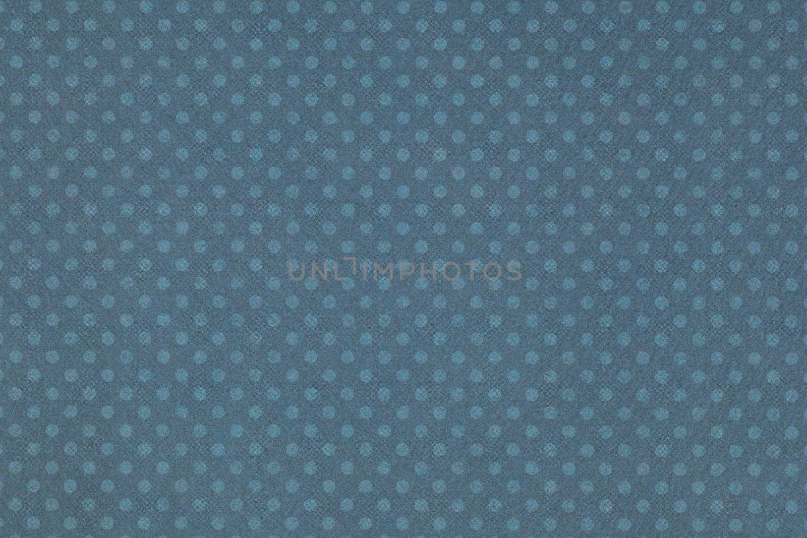 Colorful polka dot paper background texture.