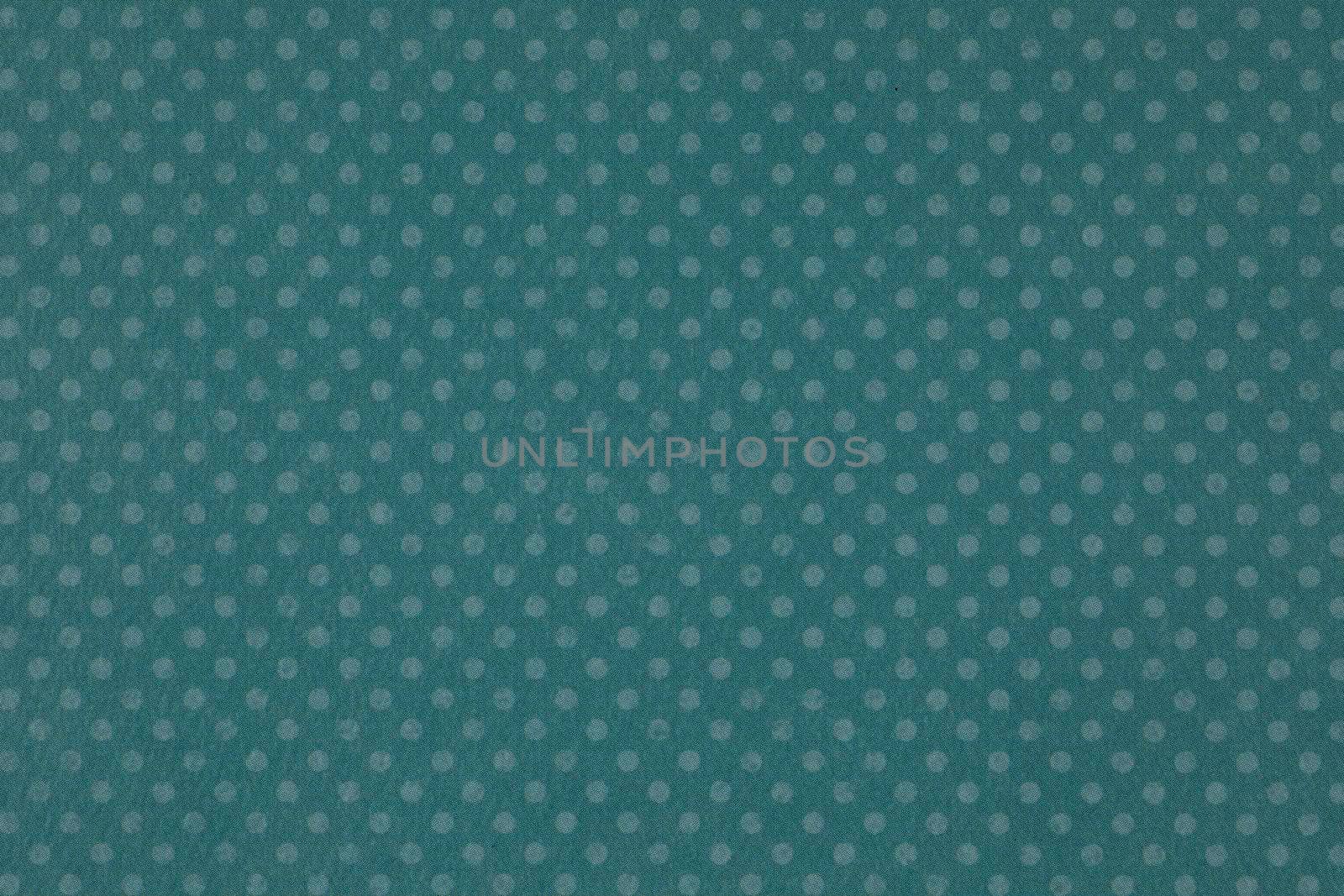 Colorful polka dot paper background texture.