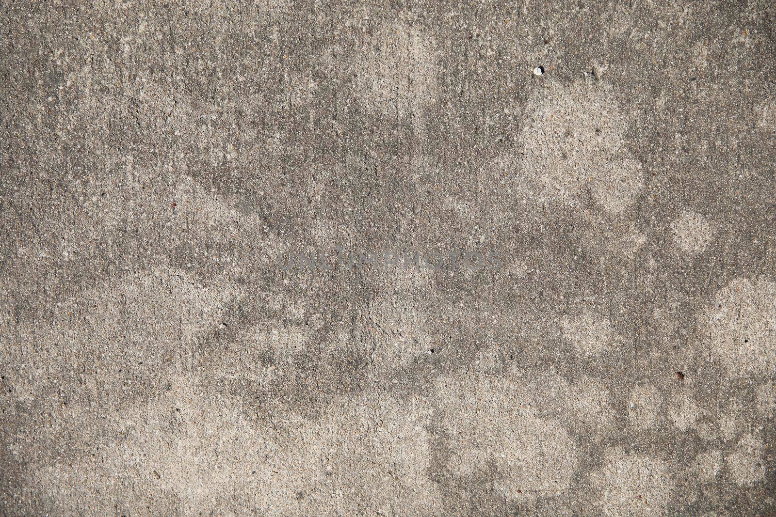 Sidewalk concrete  texture with spots and chips