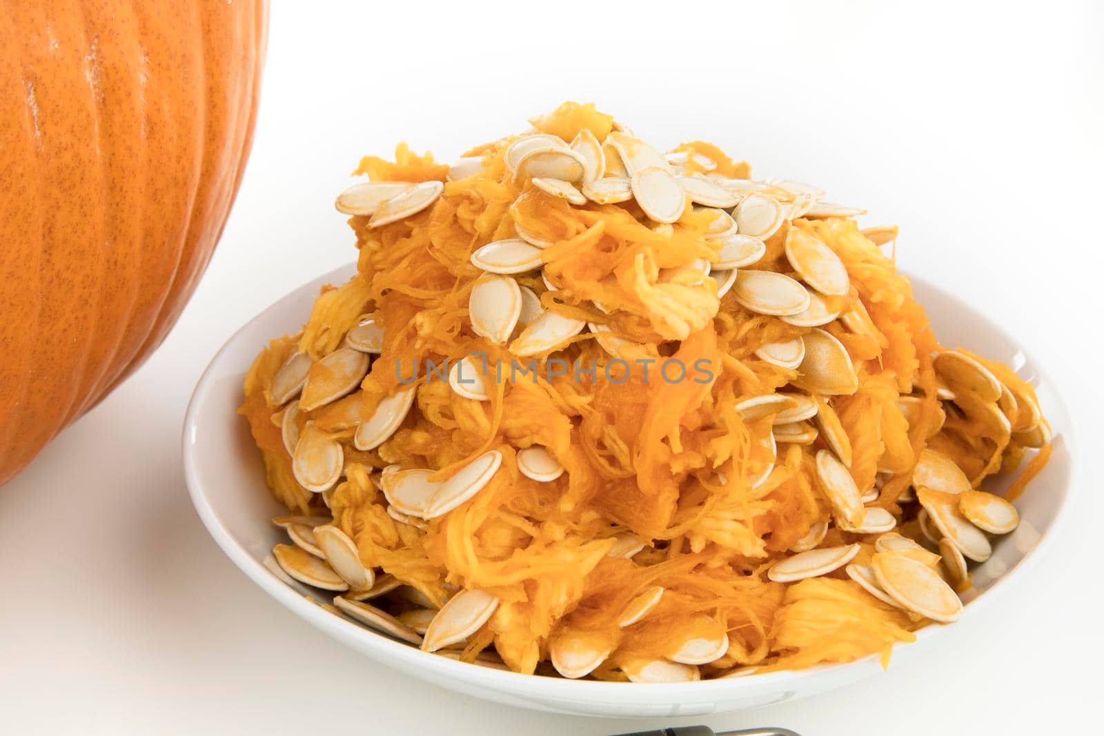 Seeds and pumpkin scrapings from preparing pumpking for carving