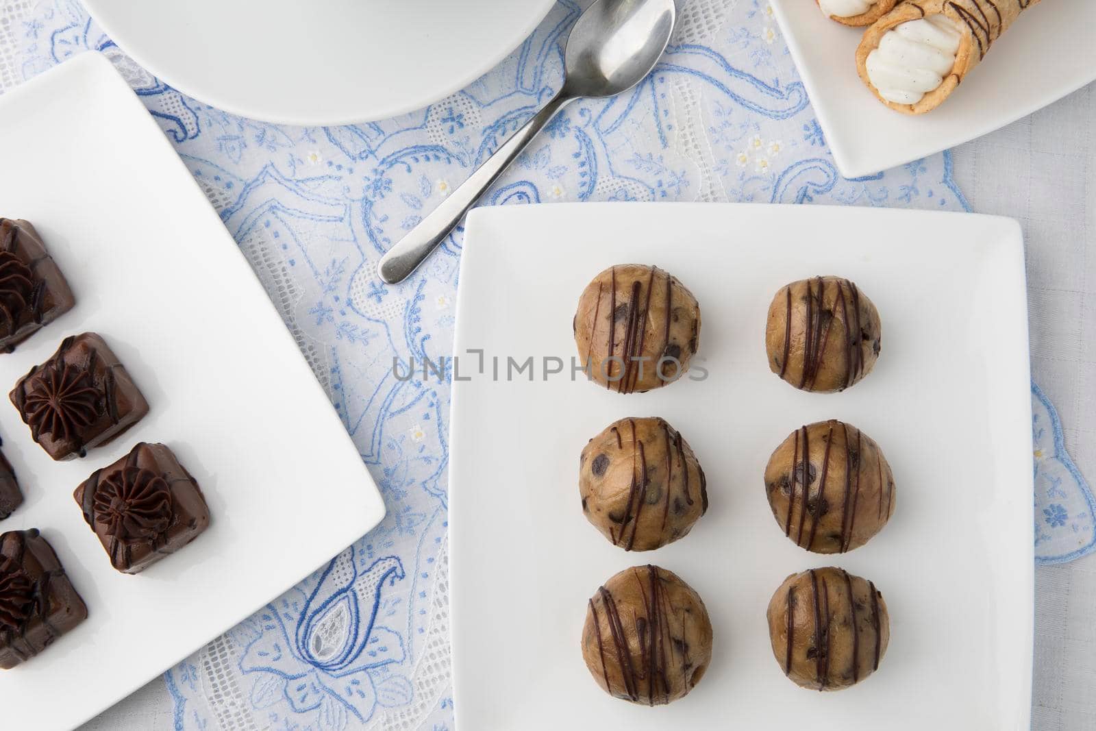 Cookie dough style chocolate treats and other sweet treats flat lay.