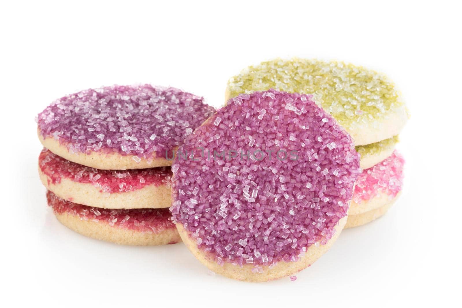 Colorful shortbread sugar cookies on white background with shadow