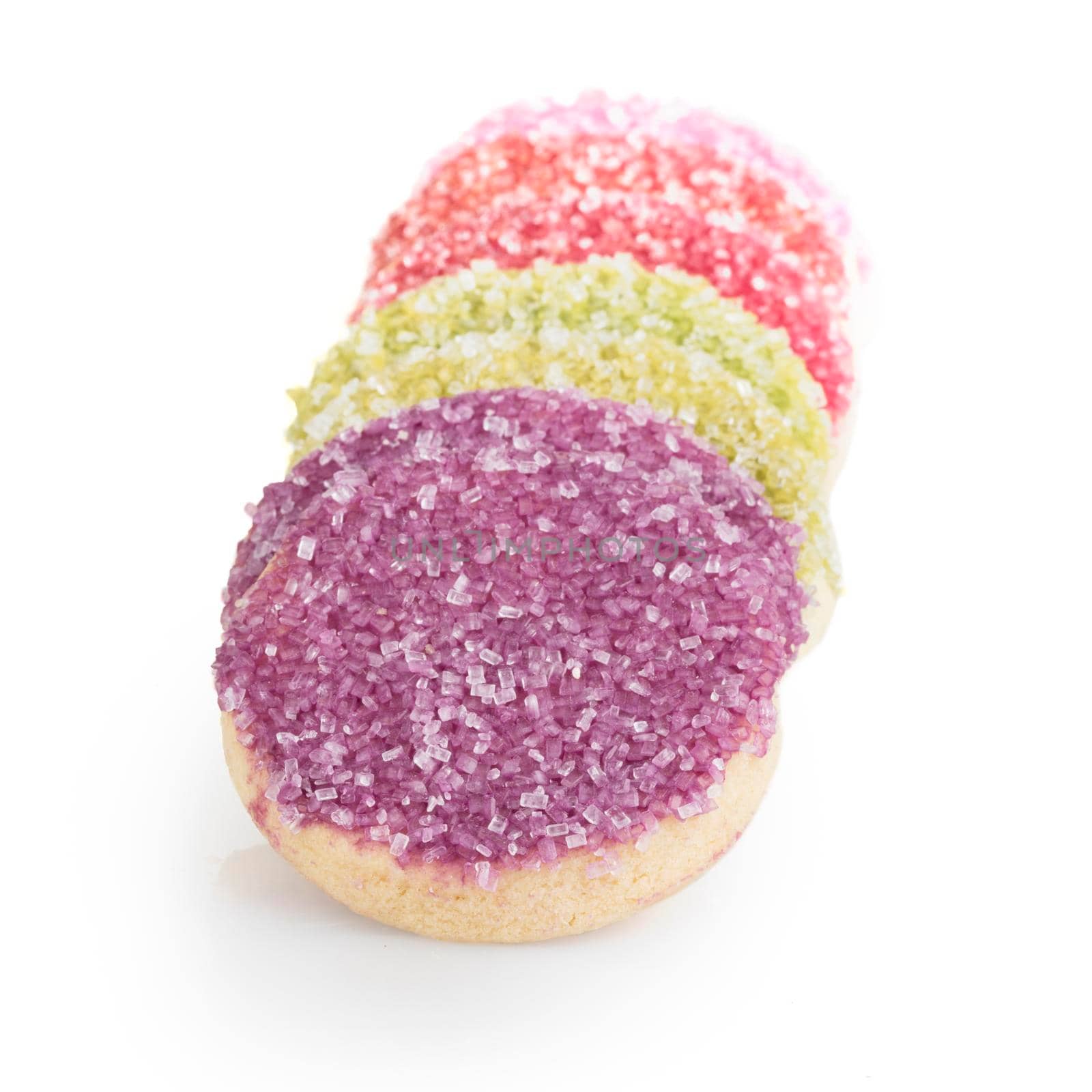 Colorful shortbread sugar cookies on white background with shadow