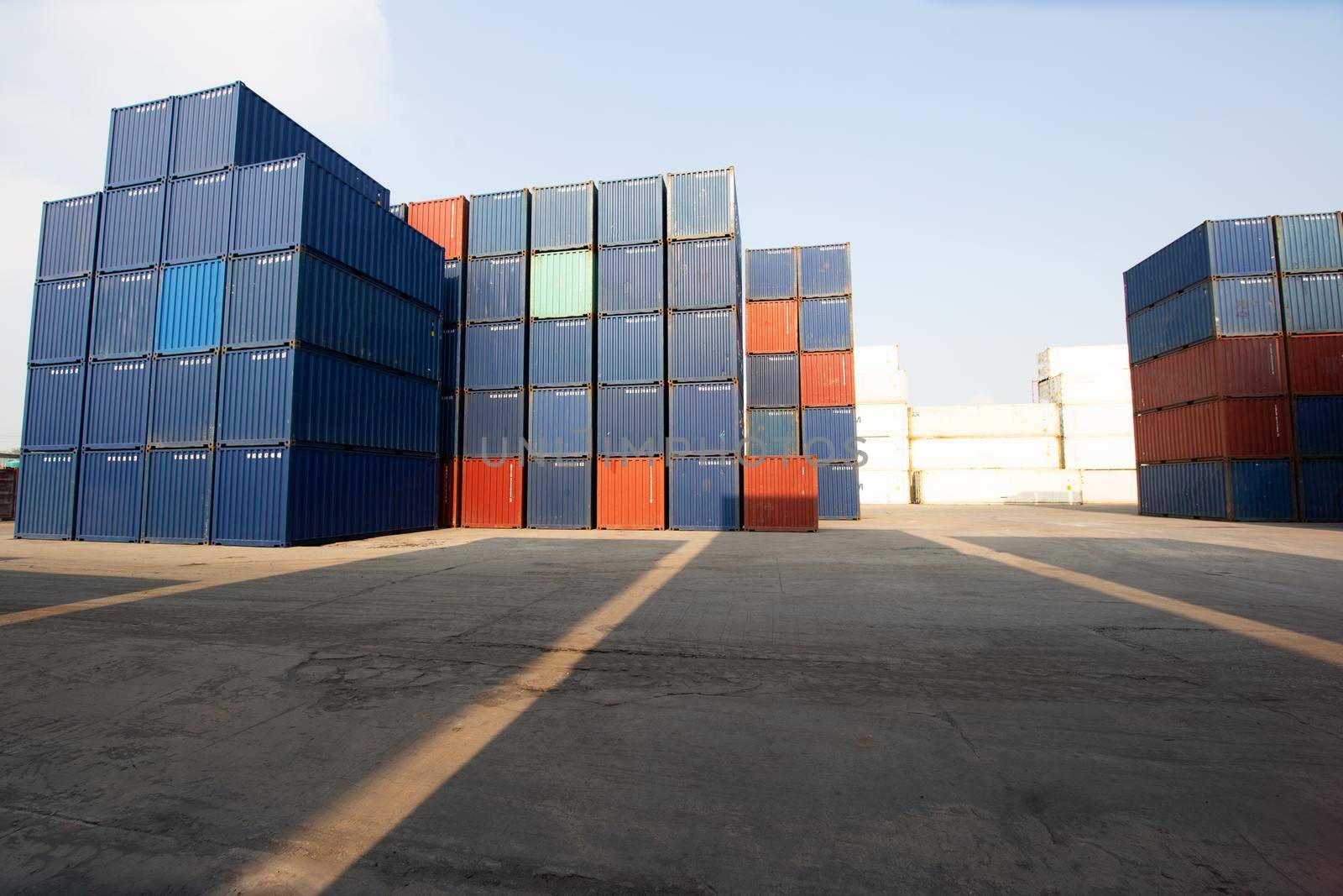 Container Cargo Port Ship Yard Storage Handling of Logistic Transportation Industry. Row of Stacking Containers of Freight Import/Export Distribution Warehouse. Shipping Logistics Transport Industrial, container box in warehouse in shipping port.