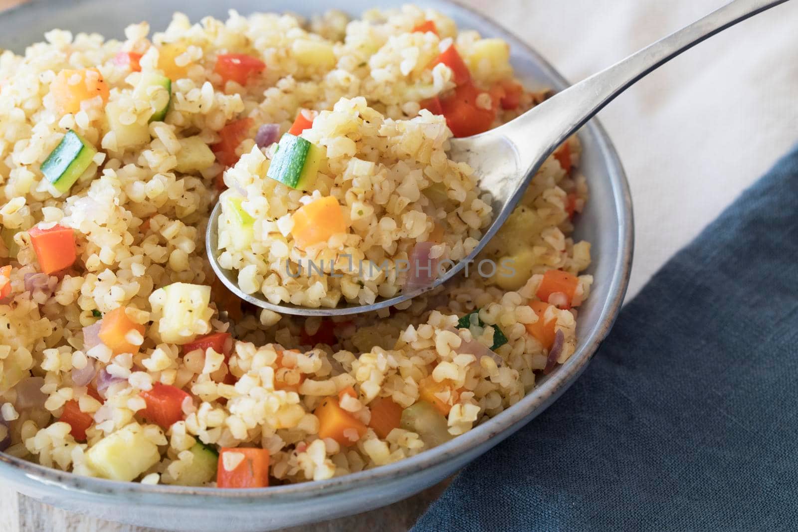 Spoonful of Bulgur Pilaf by charlotteLake